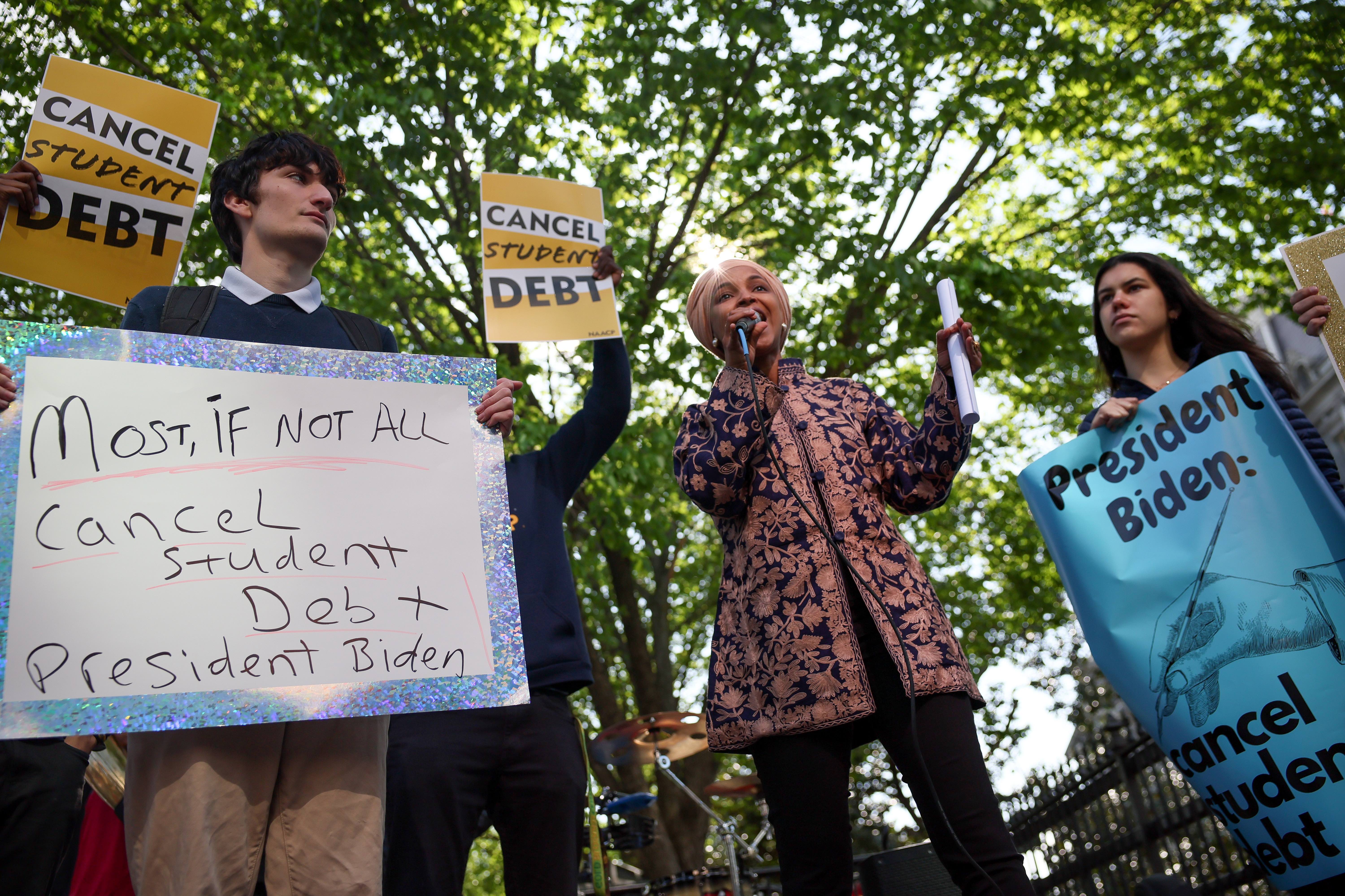 Representative Ilhan Omar (D-MN) joins activists in a demonstration outside an entrance to the White House calling for the cancellation of student debt in Washington, U.S