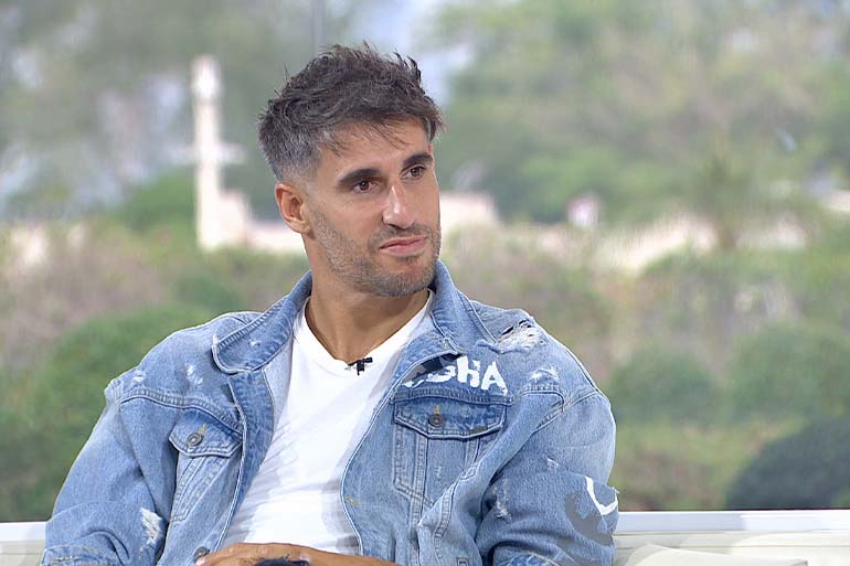 A photo of Javi Martinez sitting.