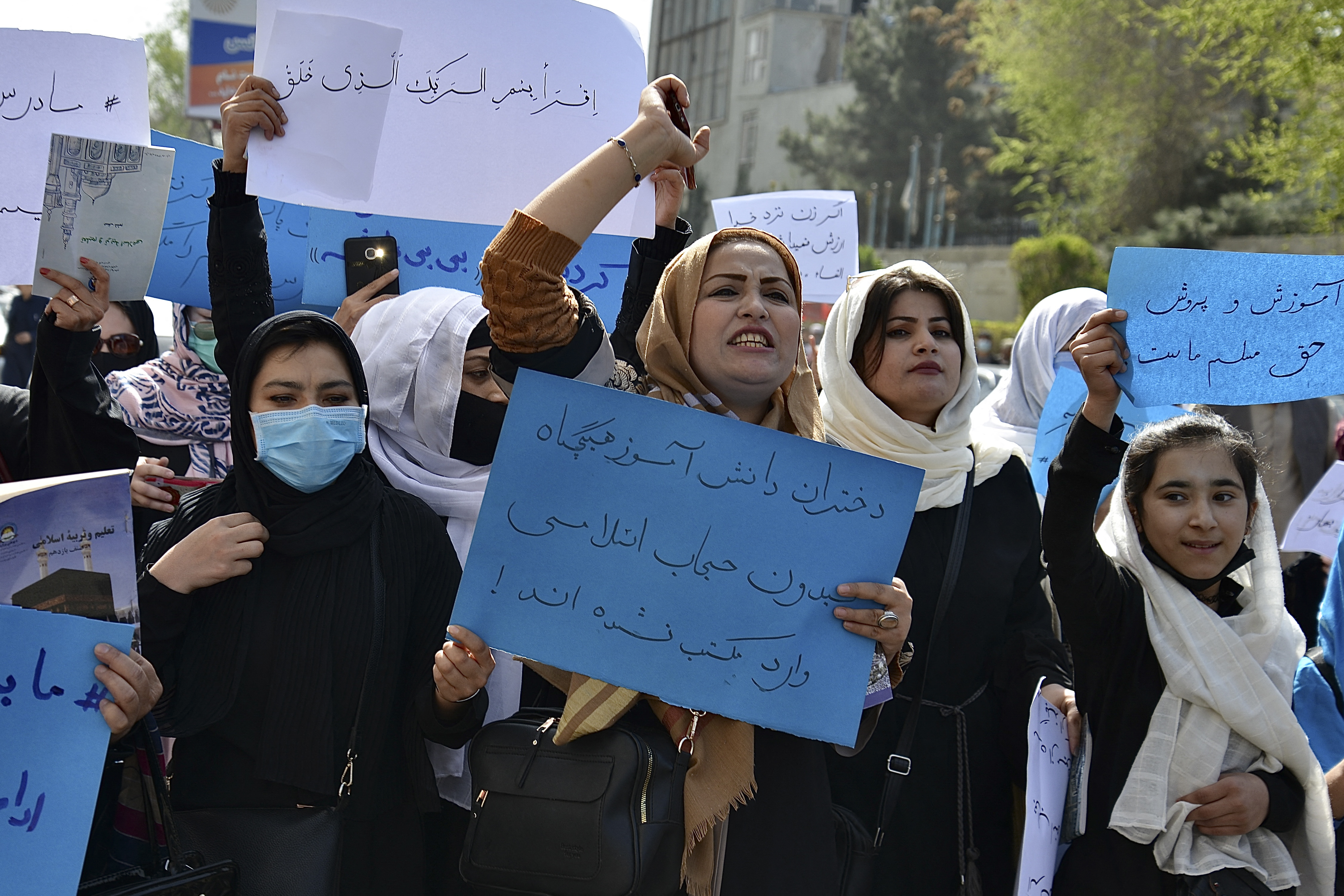Afghan women and girls take part in a protest in Kabul.
