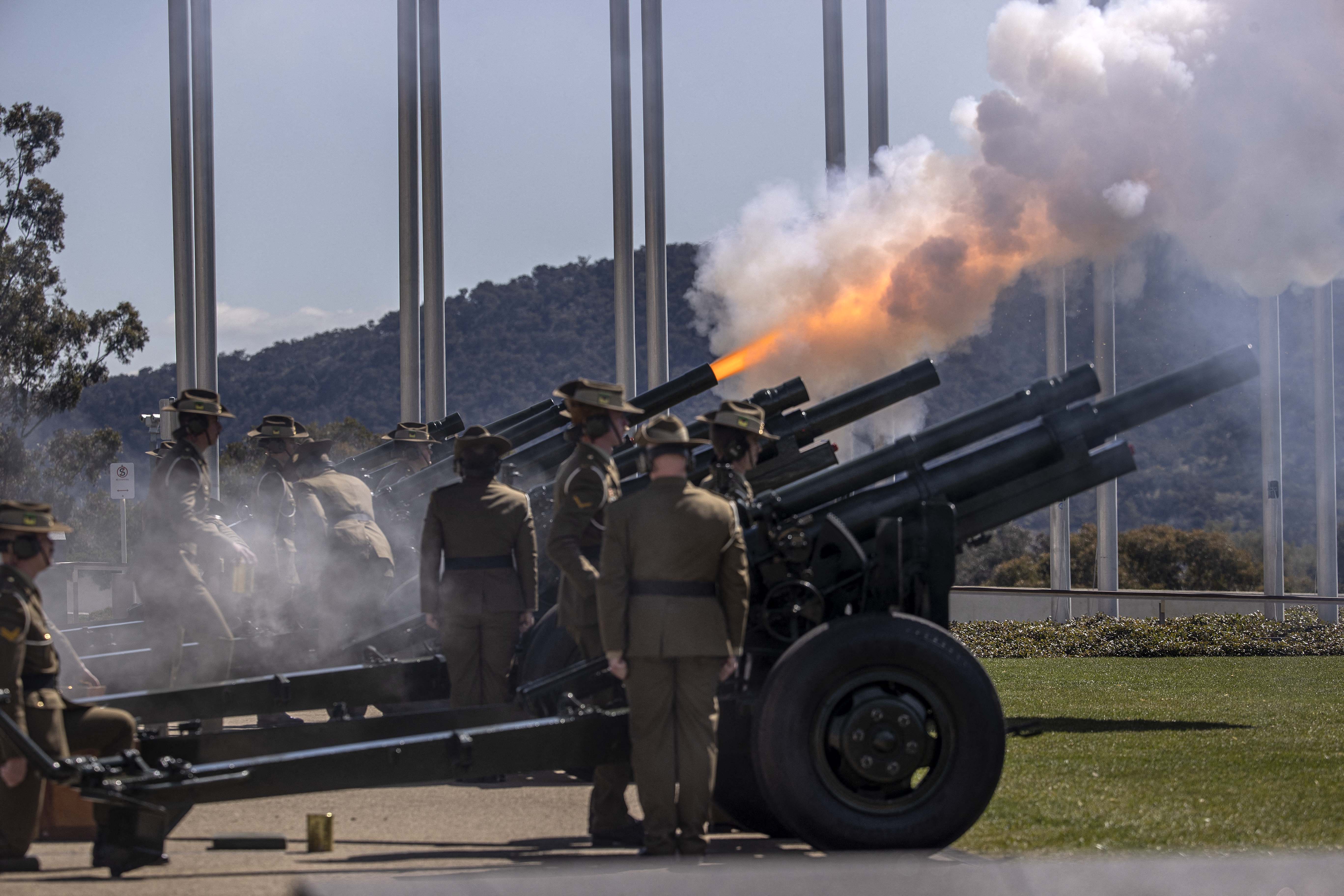 Members of the Australian Defence Force conduct a 21 gun salute during a Proclamation of Accession ceremony for Britain's King Charles III at Parliament House in Canberra on September 11, 2022.