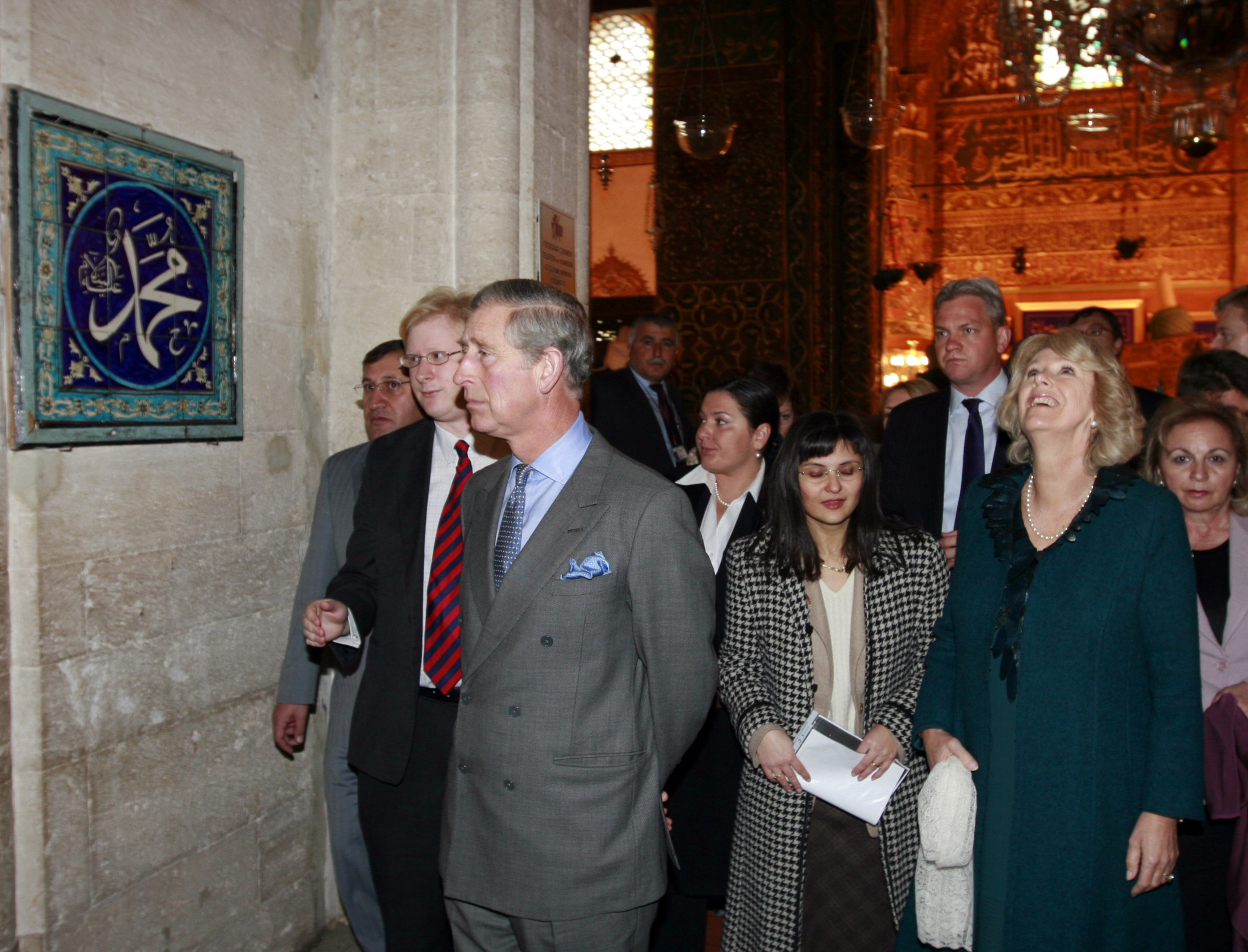 Britain's Prince Charles (front L) and his wife Camilla