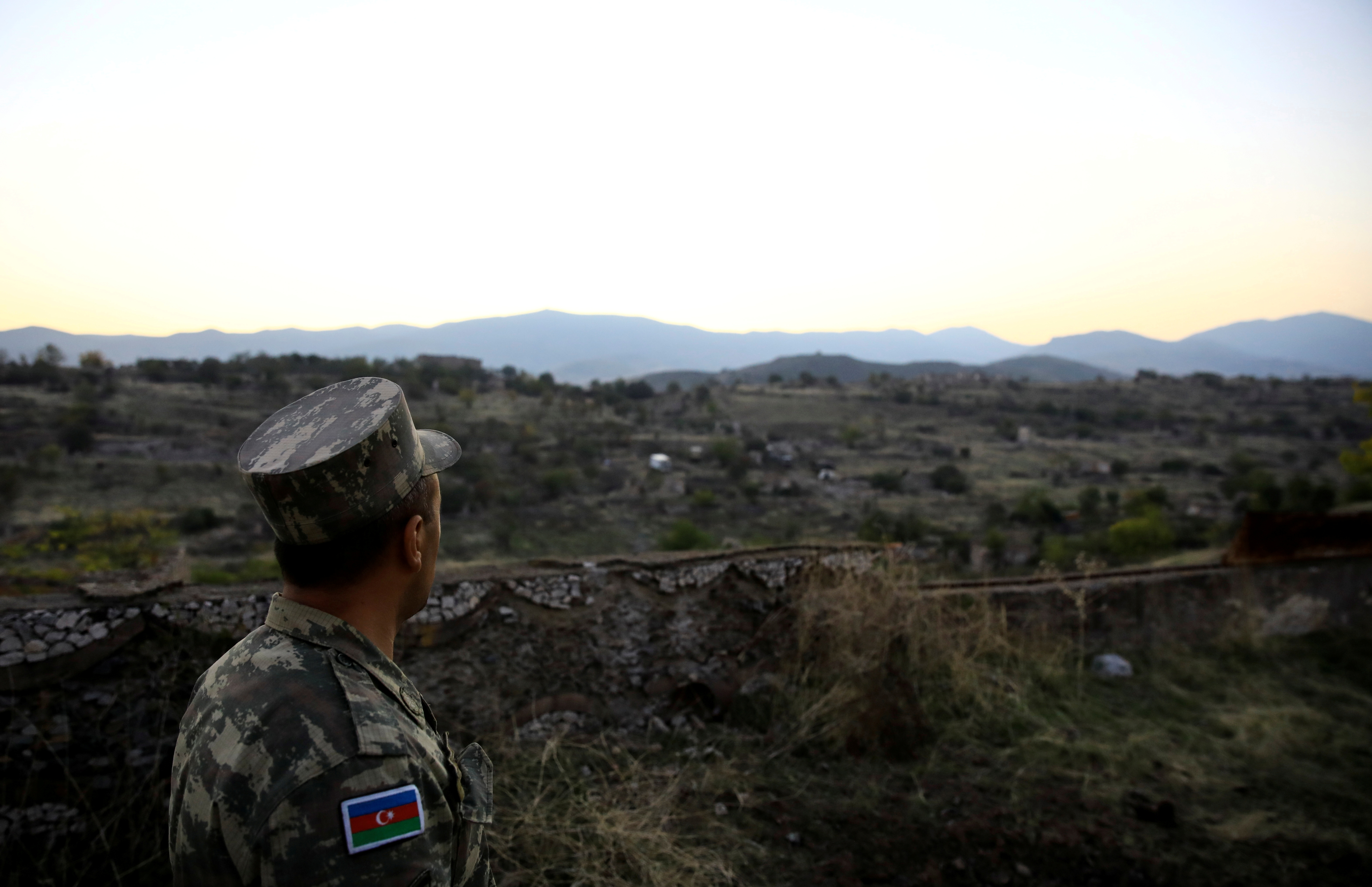 An Azeri soldier is seen standing guard