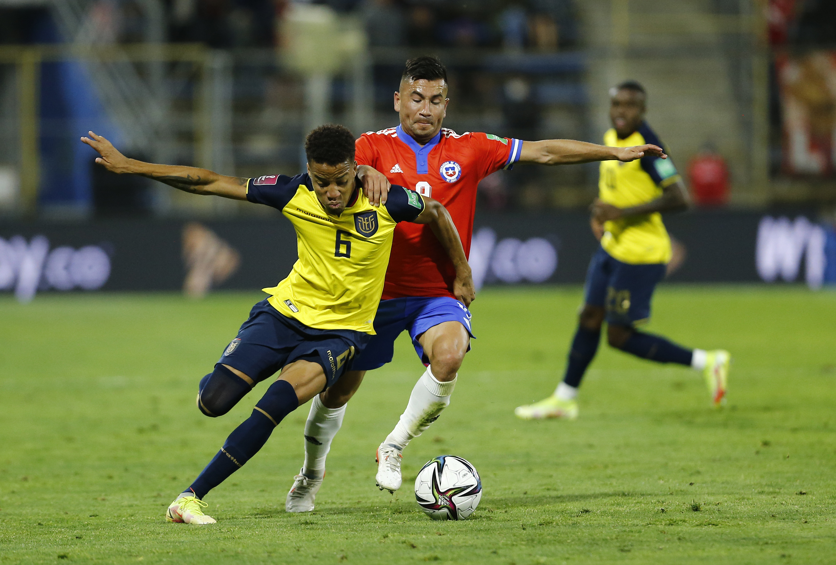 Soccer Football - World Cup - South American Qualifiers - Chile v Ecuador - Estadio San Carlos de Apoquindo, Santiago, Chile - November 16, 2021 Ecuador's Byron Castillo in action with Chile's Jean Meneses Pool via REUTERS/Marcelo Hernandez
