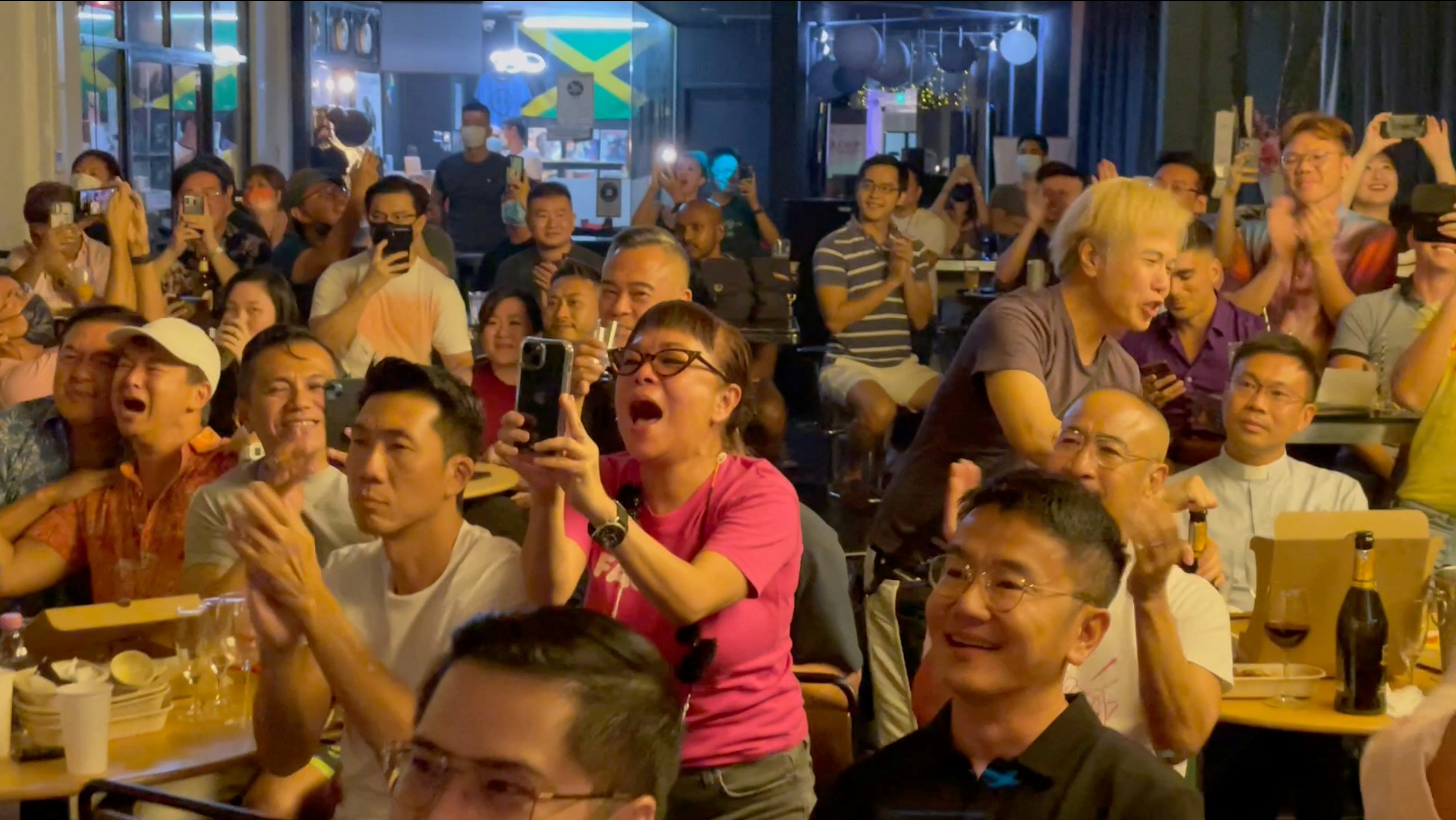 People clap and cheer as Singapore PM Lee Hsien Loong announces Section 377A will be repealed