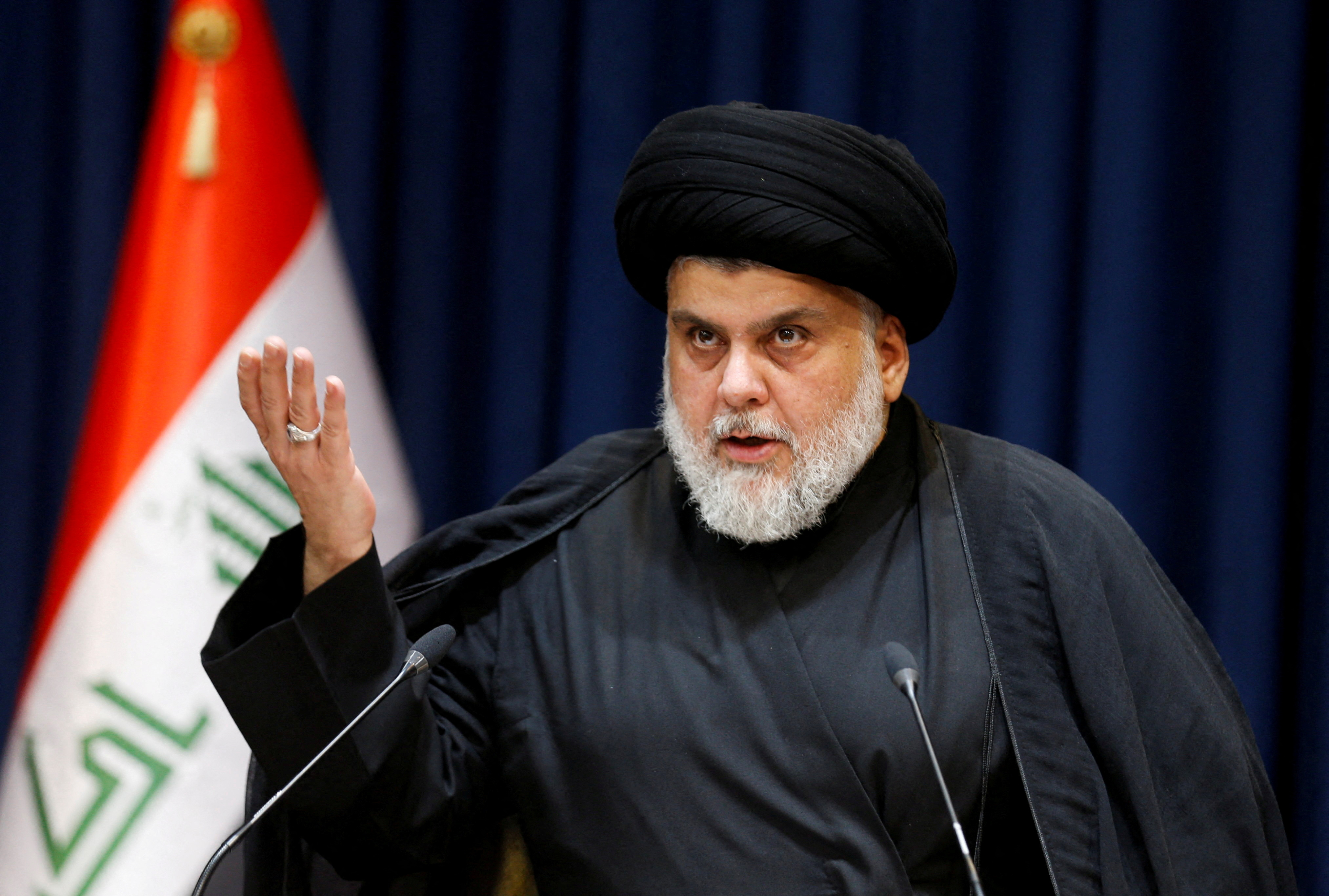 FILE PHOTO: Iraqi populist leader Muqtada al-Sadr delivers a televised speech in Najaf, Iraq August 3, 2022.