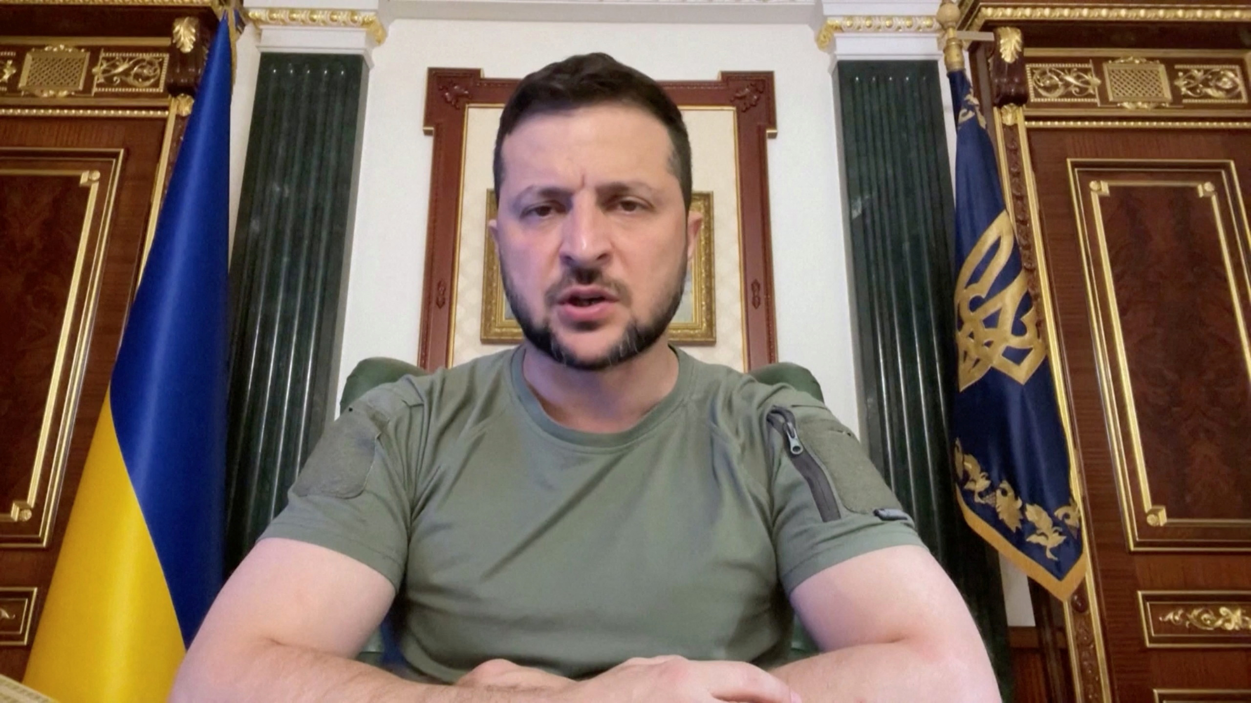 Ukrainian President Volodymyr Zelenskiy speaks during his nightly address where he mentions that Ukrainian troops will chase the Russian army "to the border", as his senior advisor confirmed Ukrainian troops had broken through Russian defences in several sectors of the front line near the city of Kherson, in this still image taken from video recorded in Kyiv, Ukraine, August 29, 2022. Handout via REUTERS