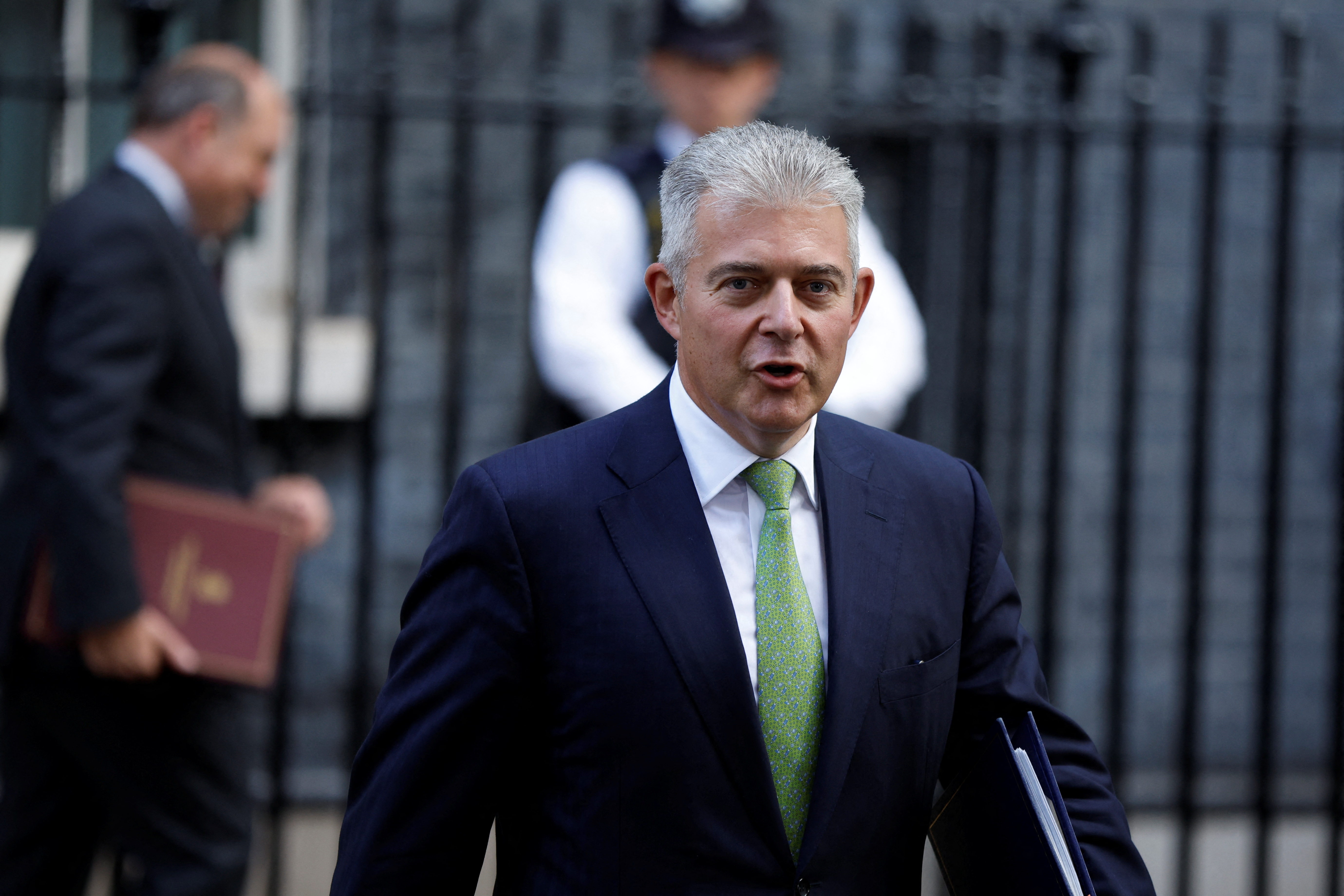 Justice Brandon Lewis walks outside Number 10 Downing Street