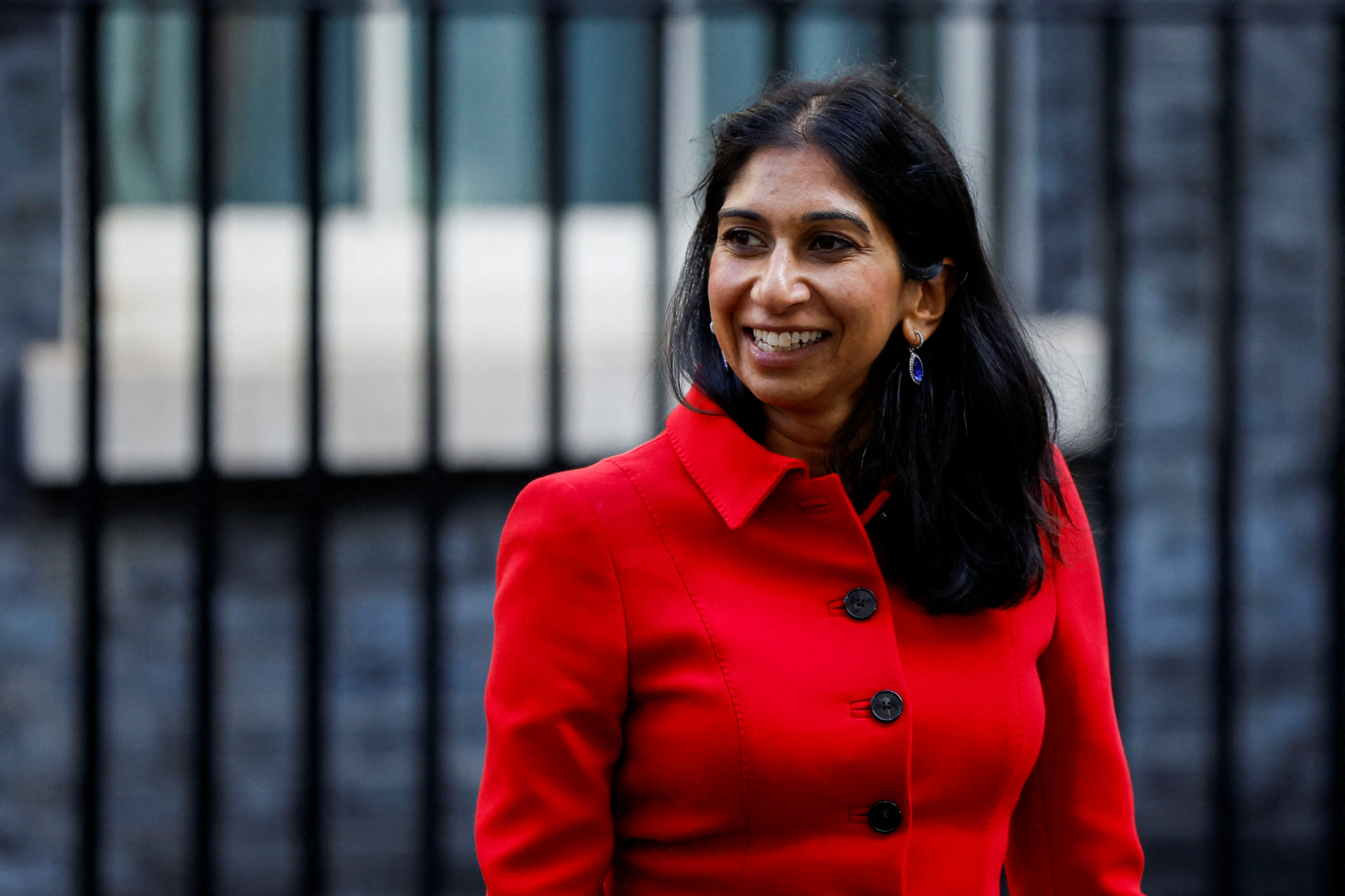 Home Secretary Suella Braverman walks outside Cabinet building