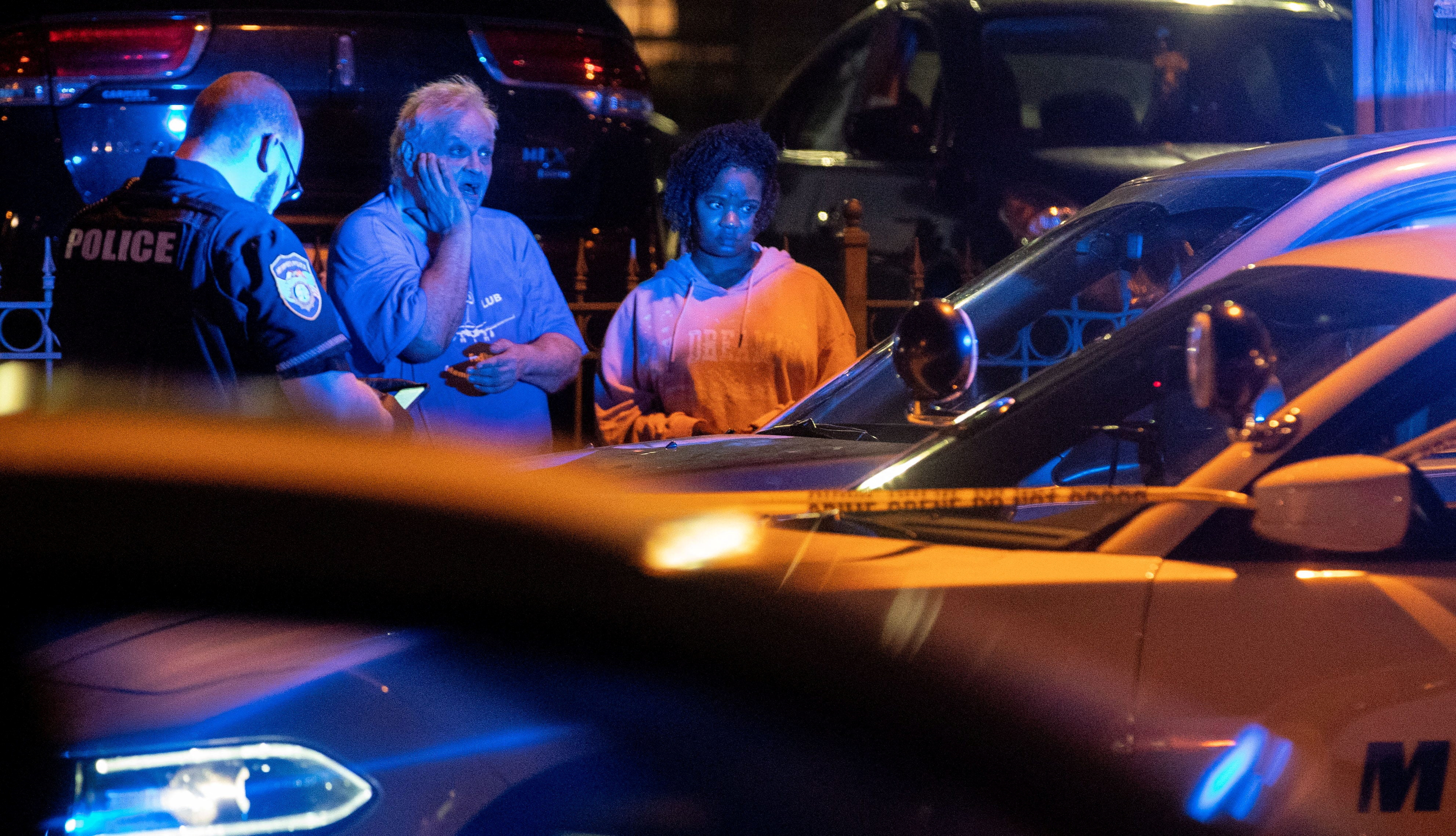 Memphis police officers work at one of multiple crime scenes they believe were committed by a man driving around shooting in Memphis, Tennessee, U.S. September 7, 2022. Christine Tannous/USA Today Network via REUTERS NO RESALES. NO ARCHIVES. MANDATORY CREDIT
