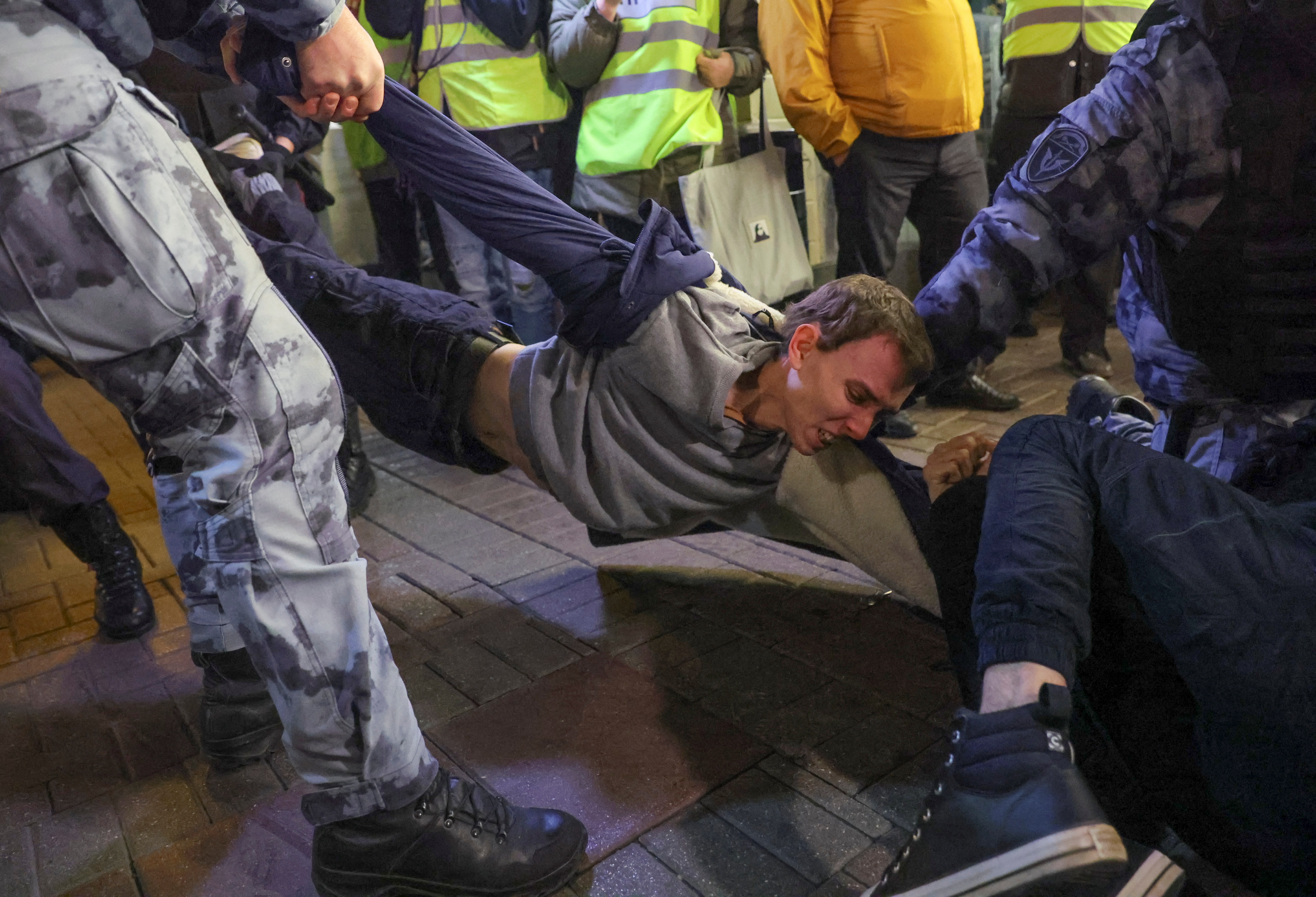 Russian police detain protester