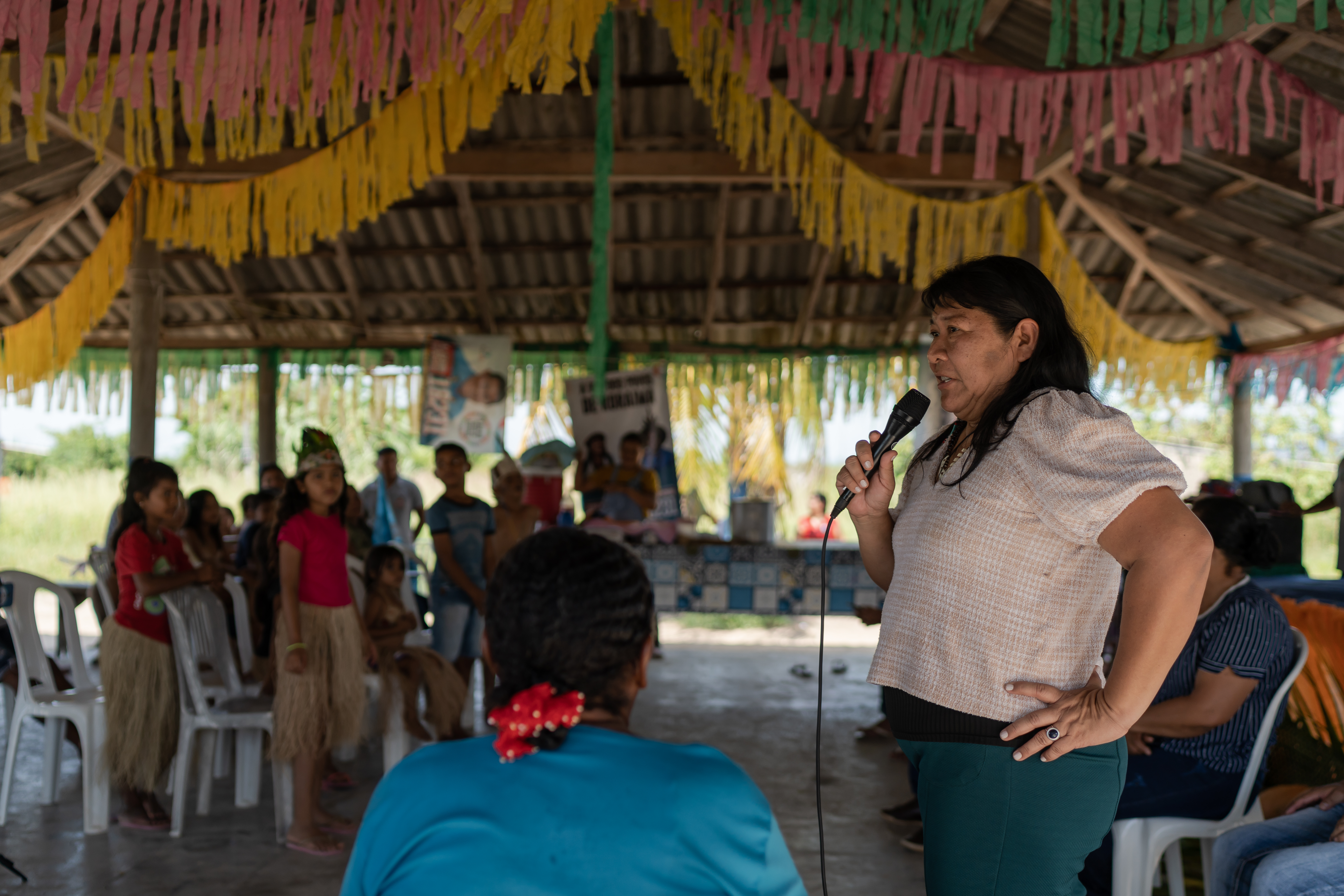 Joenia Wapichana addresses a crowd at a political campaign event.
