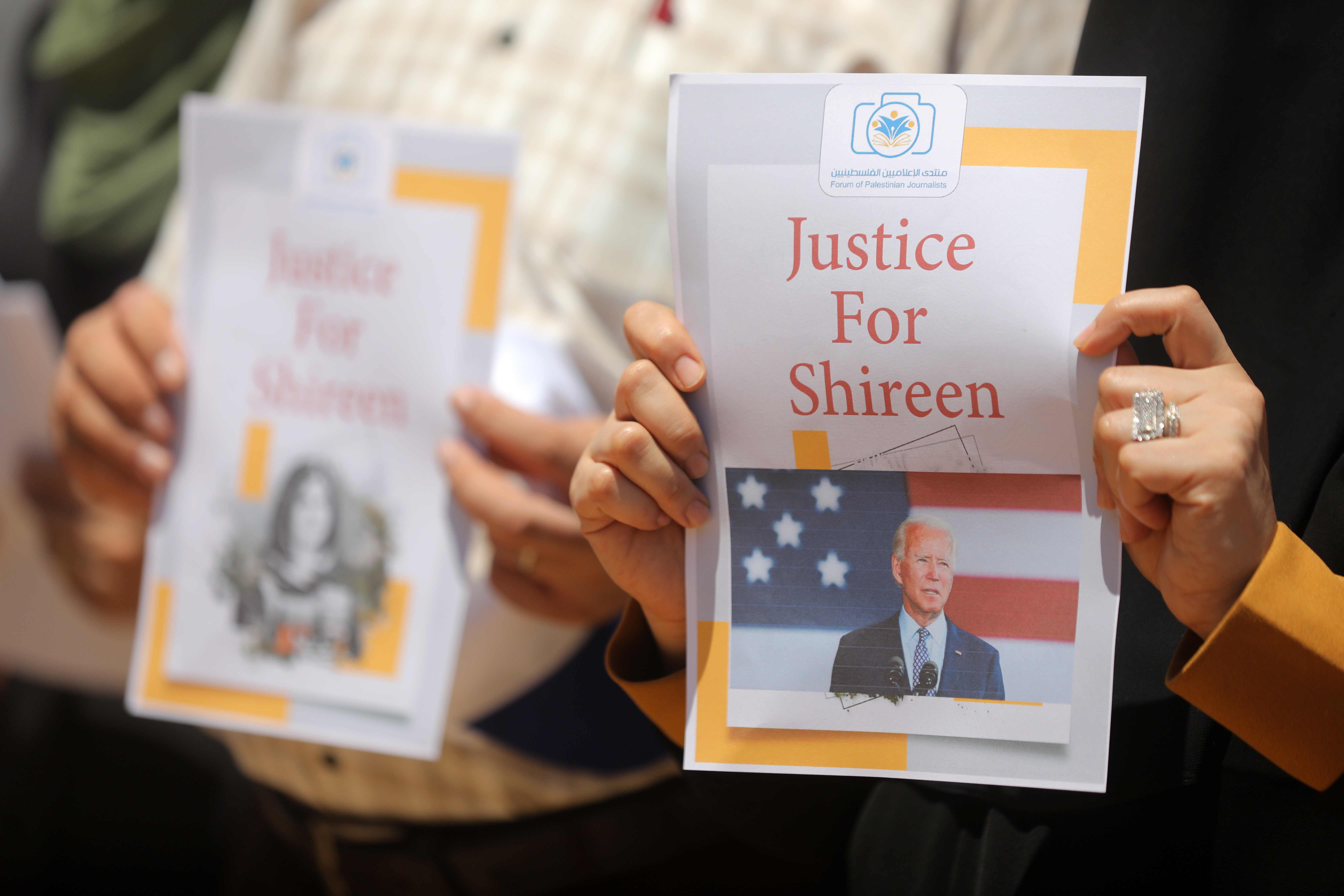 Members of the Palestinian Journalists Syndicate gather during a demonstration demanding justice for slain Al Jazeera journalist Shireen Abu Akleh.
