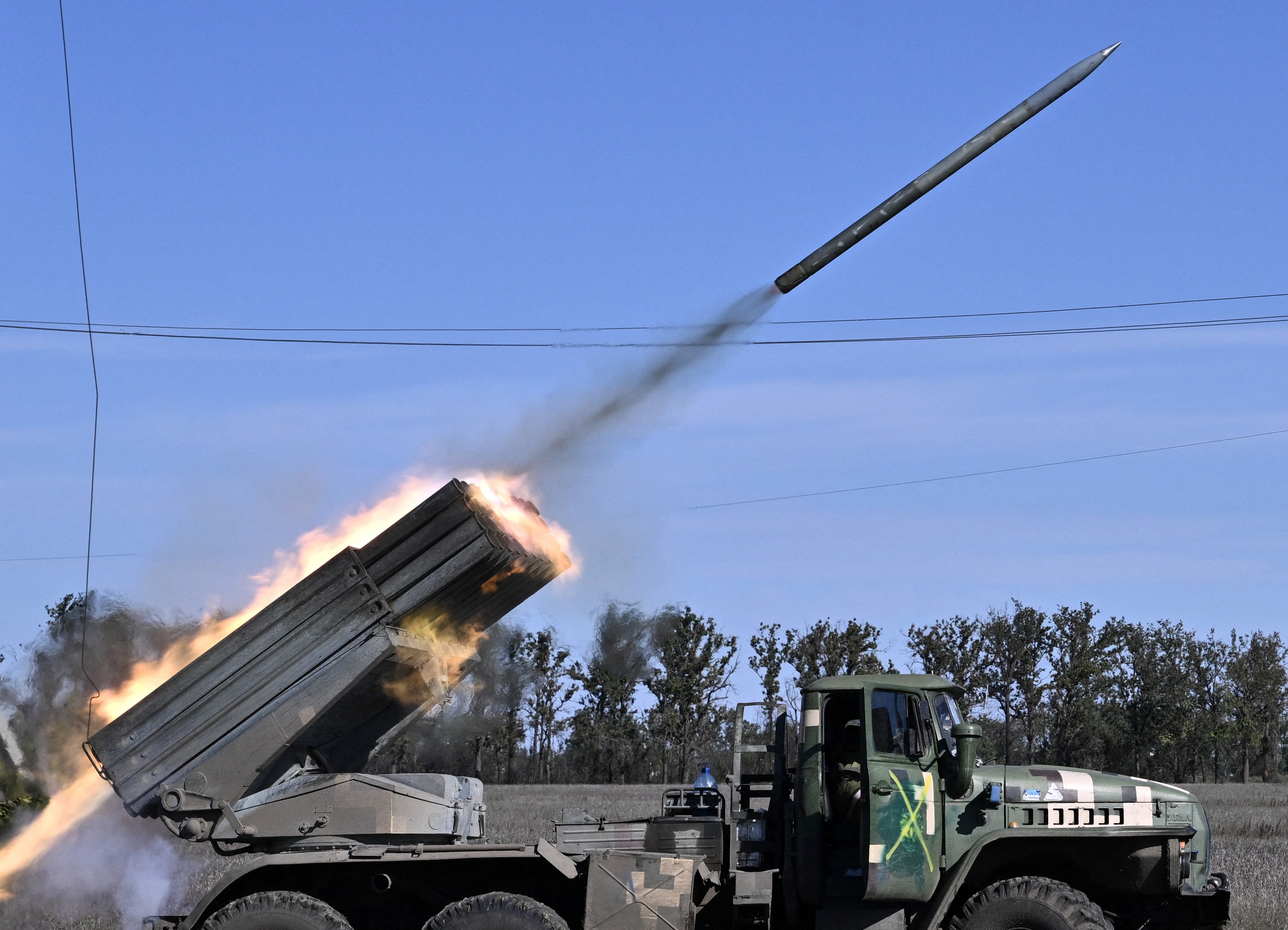 Ukrainian BM-21 'Grad' multiple rocket launcher fires a rocket towards Russian positions in an undisclosed location in the South of Ukraine on October 3, 2022, amid the Russian invasion against Ukraine.