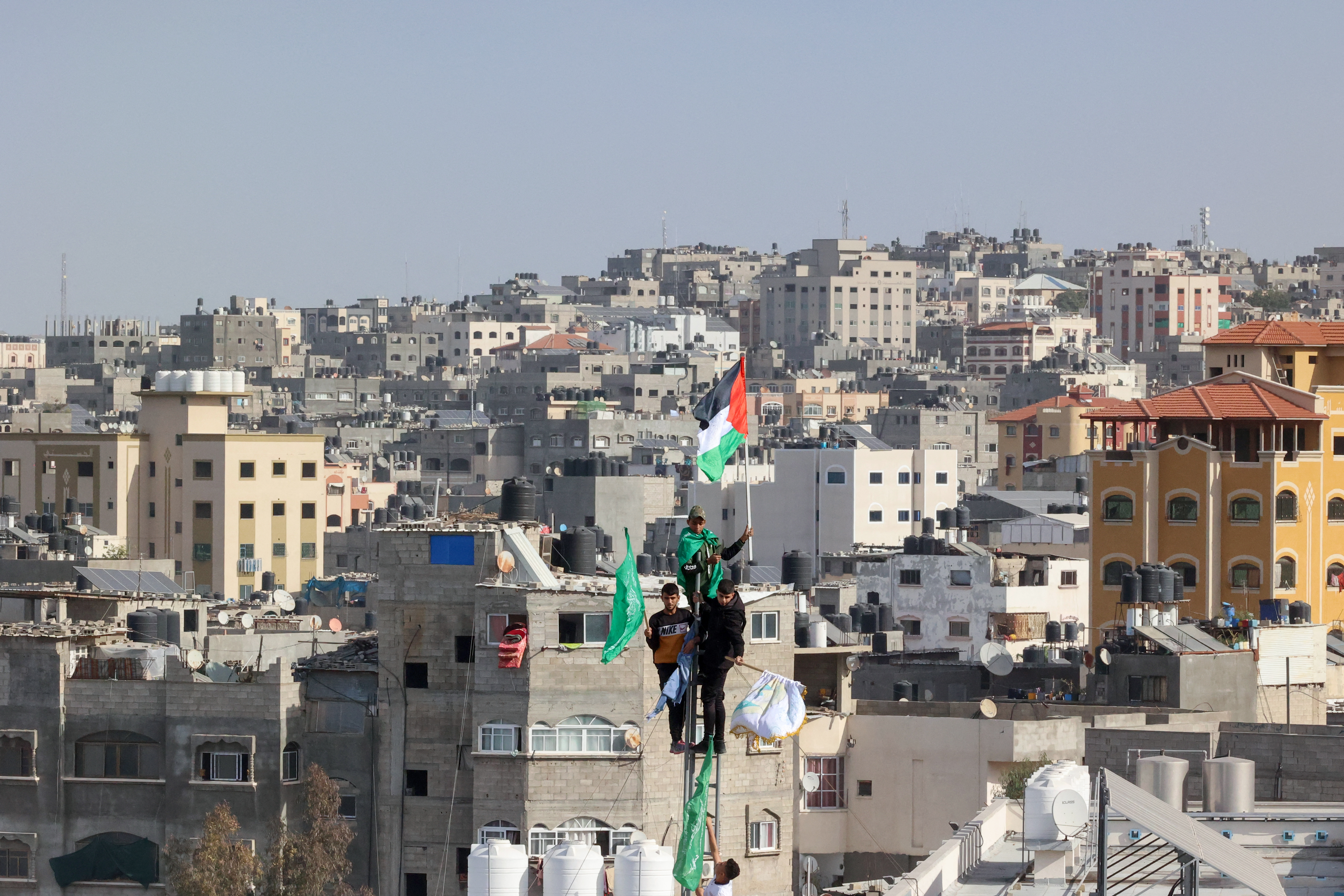 People take part in a rally in the Jabalia camp for Palestinian refugees in the north of the Gaza Strip.