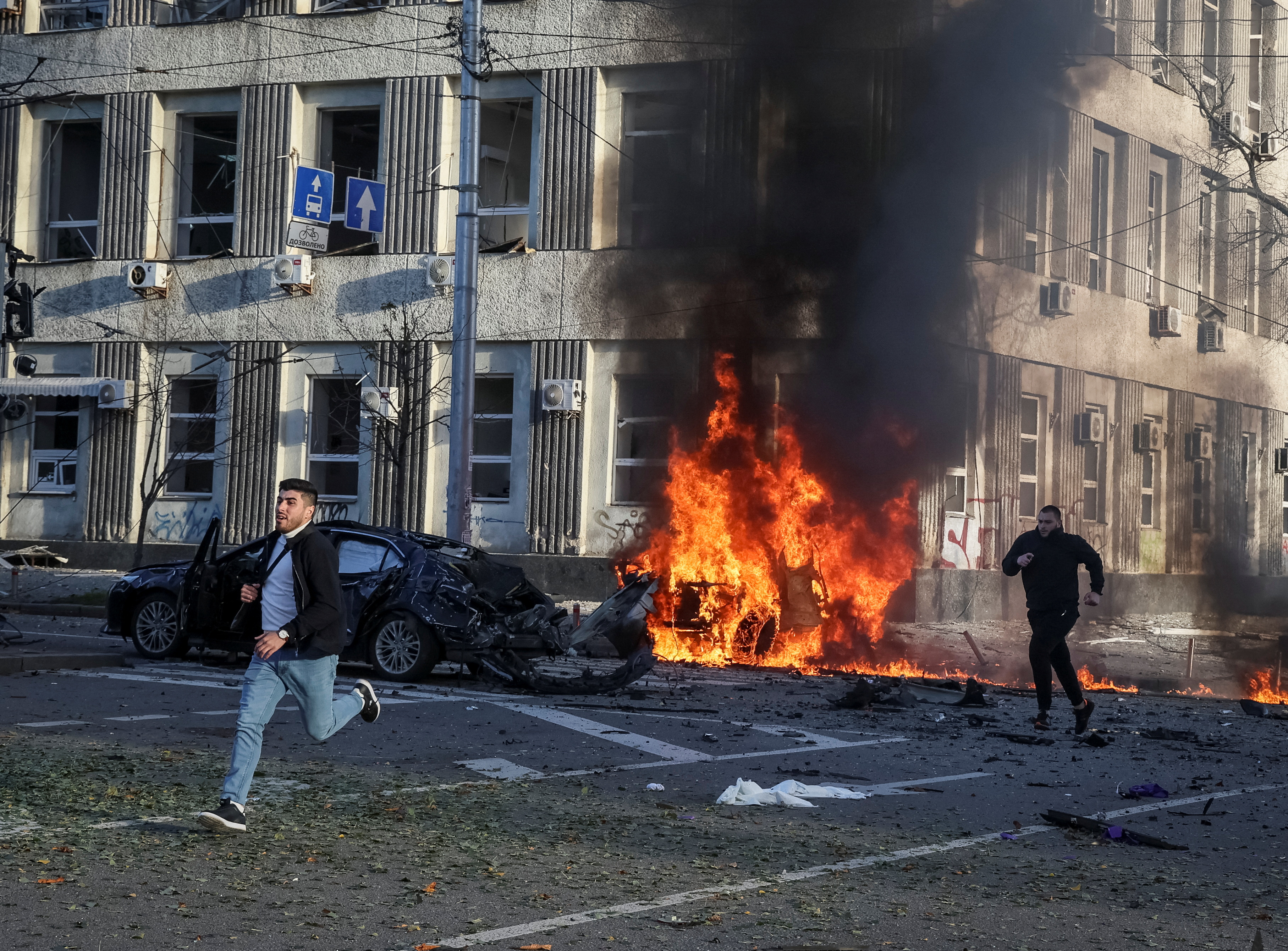 Cars burn after Russian missile strike in Kyiv
