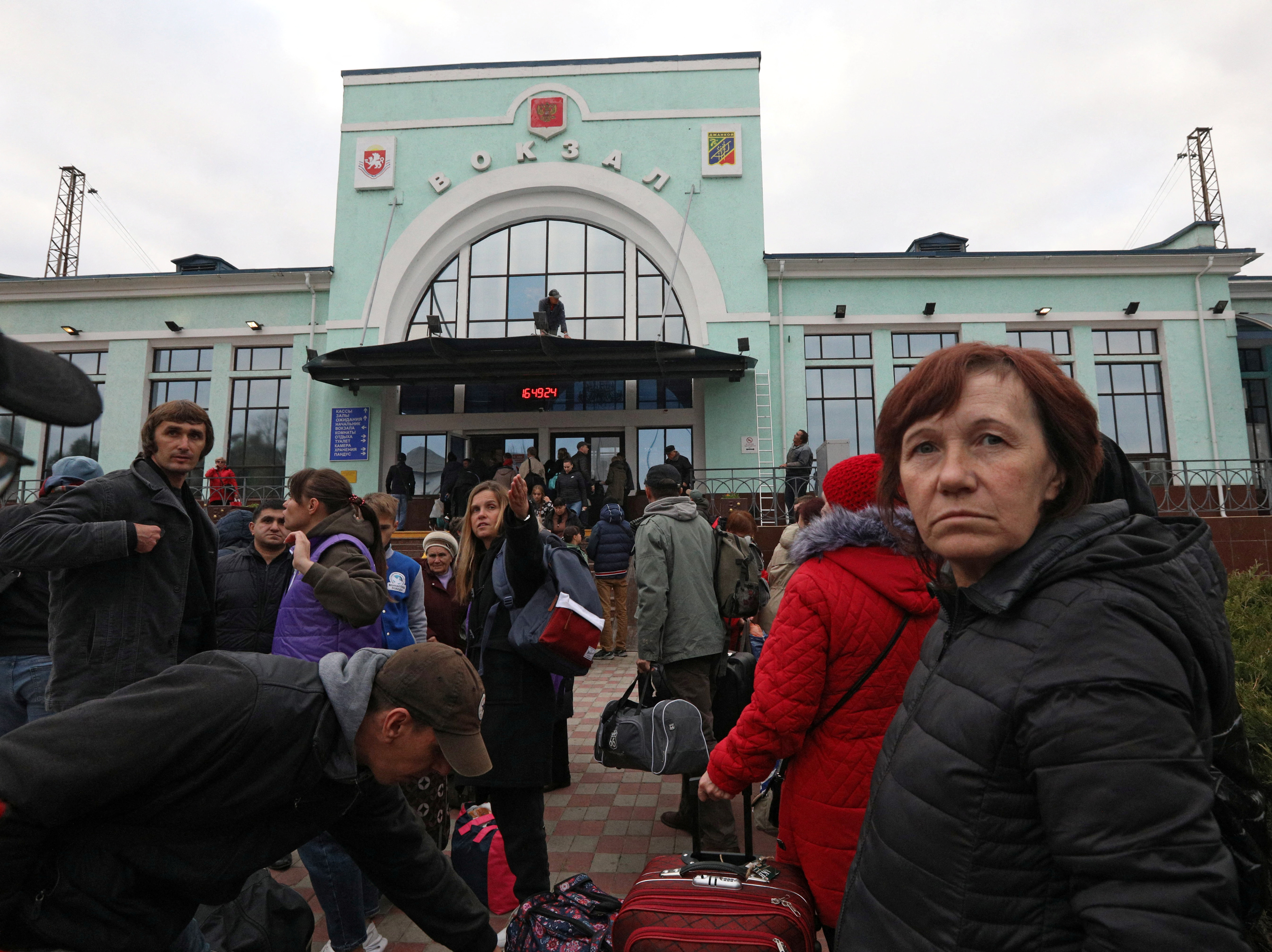 Civilians evacuated from the Russian-controlled city of Kherson