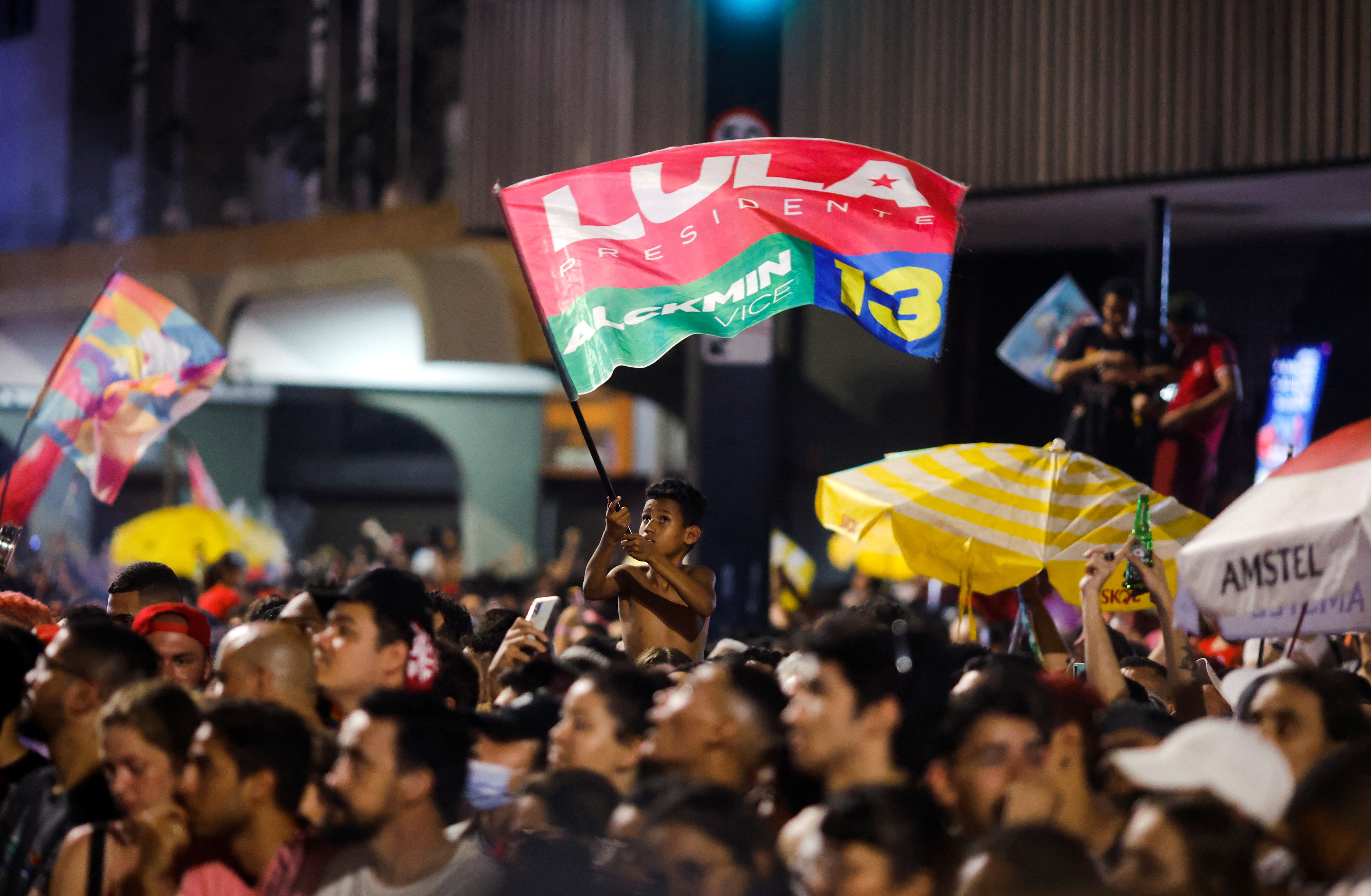 Supporters of Brazil's former President and presidential candidate Luiz Inacio Lula da Silva gather on the day of the Brazilian presidential election run-off, in Sao Paulo, Brazil