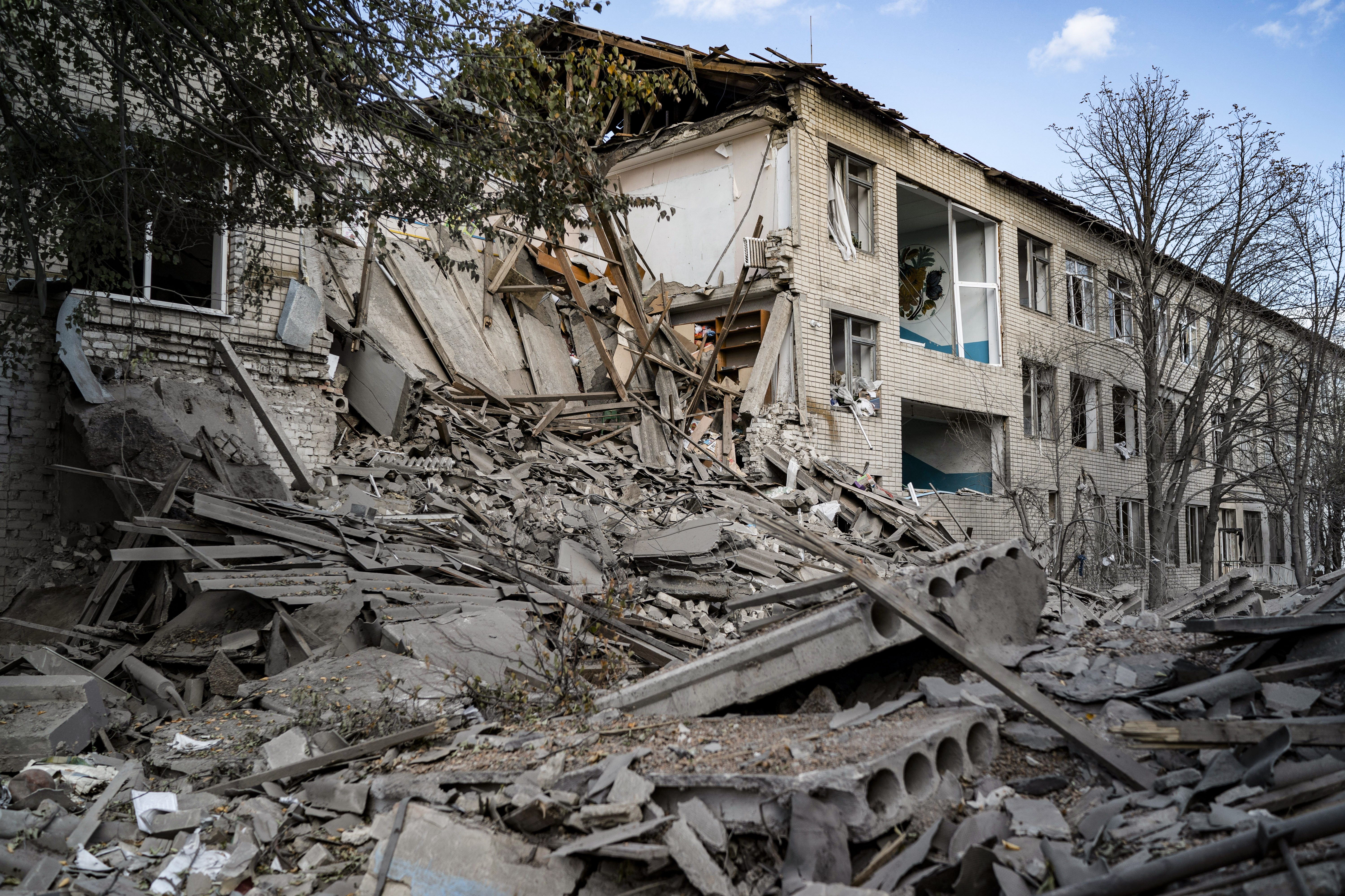 Debris covers an area of a heavily damaged school after a Russian attack, two days ago at the village of Velyka Kostromka, in Dnipropetrovsk region