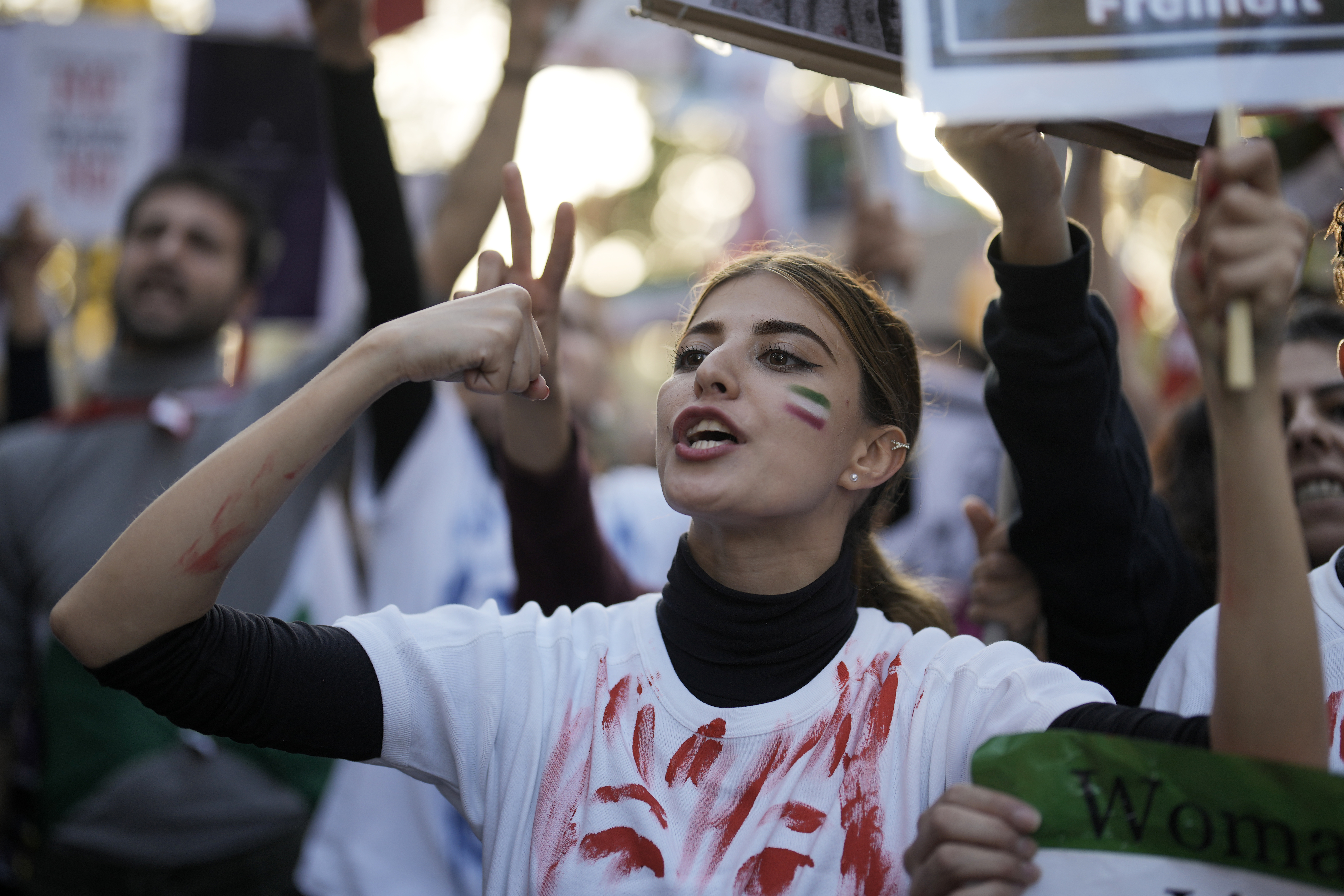 A woman shouts during a protest against the Iranian regime in Berlin.