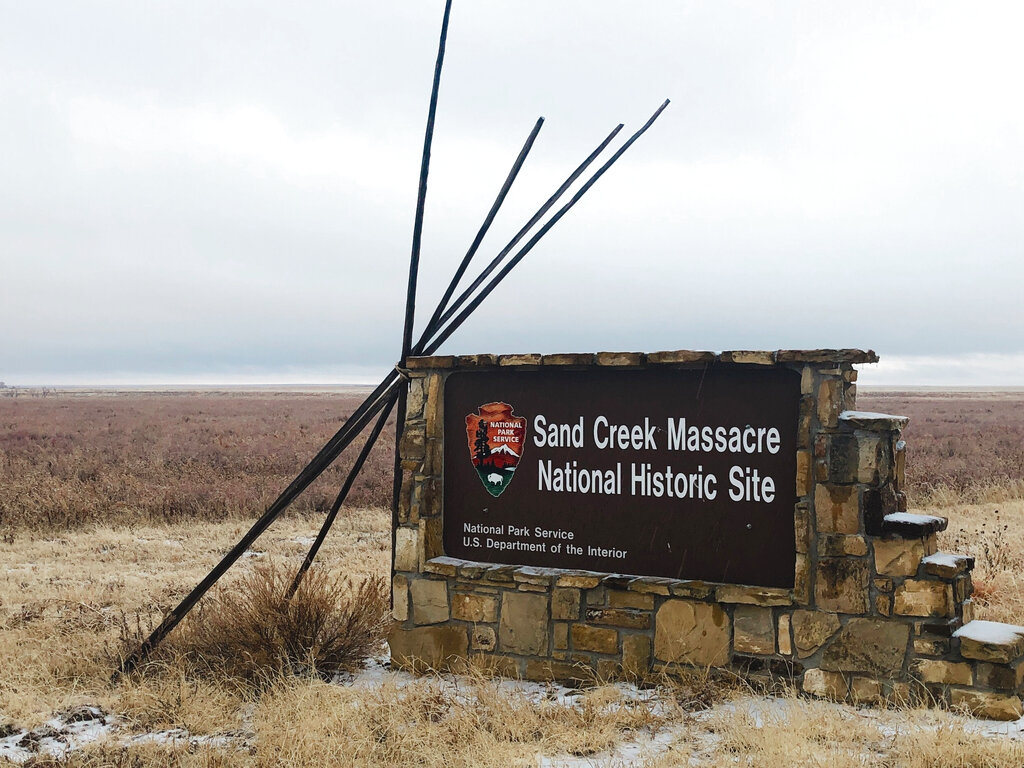 A sign marking the entrance to Sand Creek Massacre National Historical Site