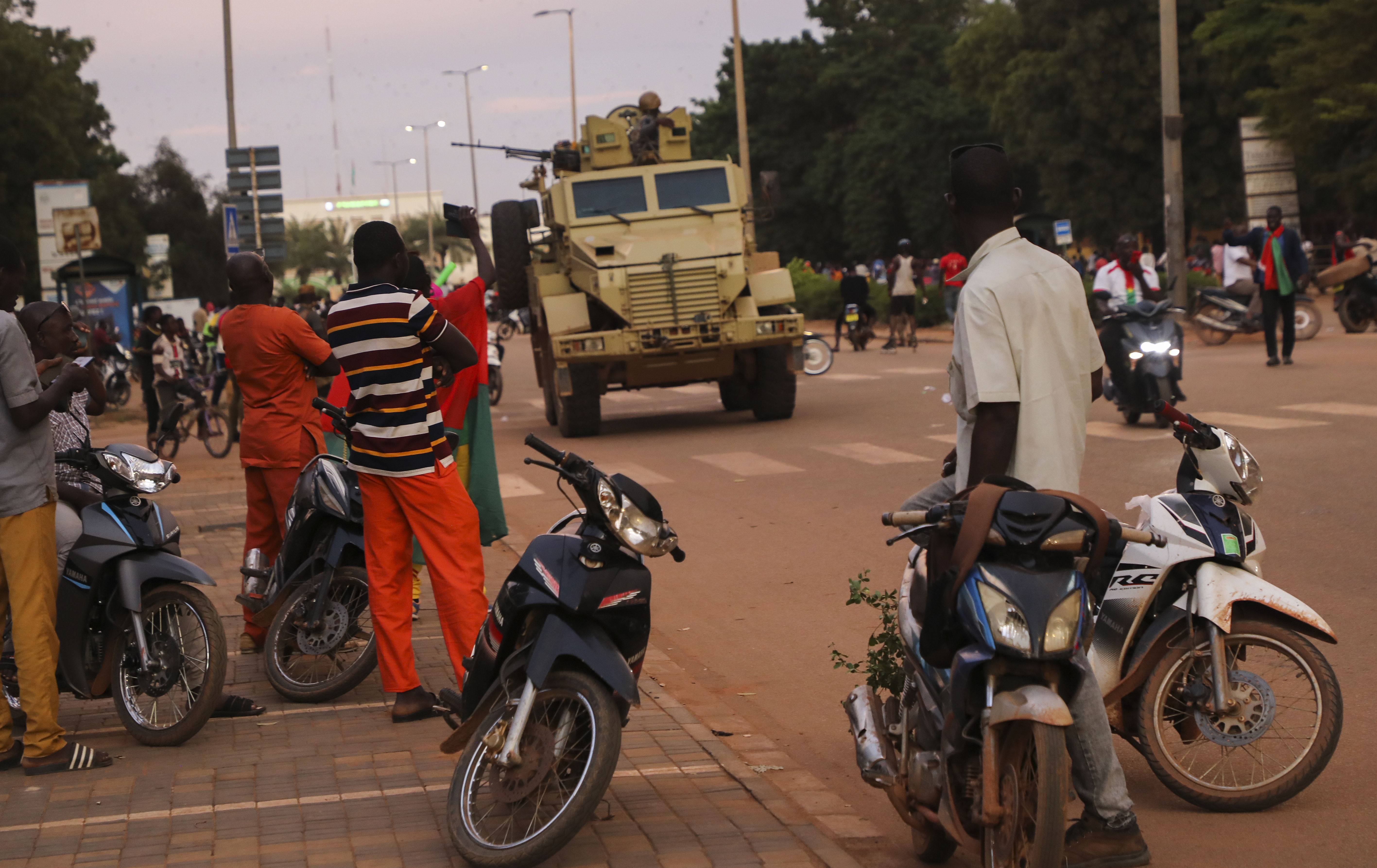 An armoured vehicle moves along a street after the French embassy was set on fire in Ouagadougou, Burkina Faso, 01 October 2022.