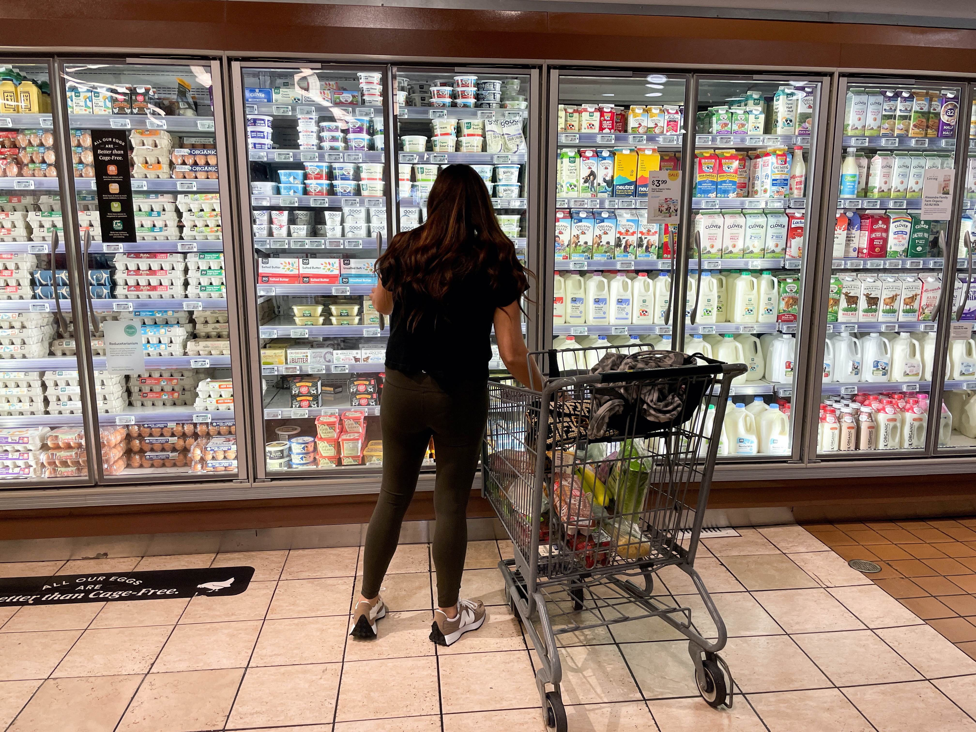 A woman shops in a supermarket as rising inflation affects consumer prices in Los Angeles, California, U.S