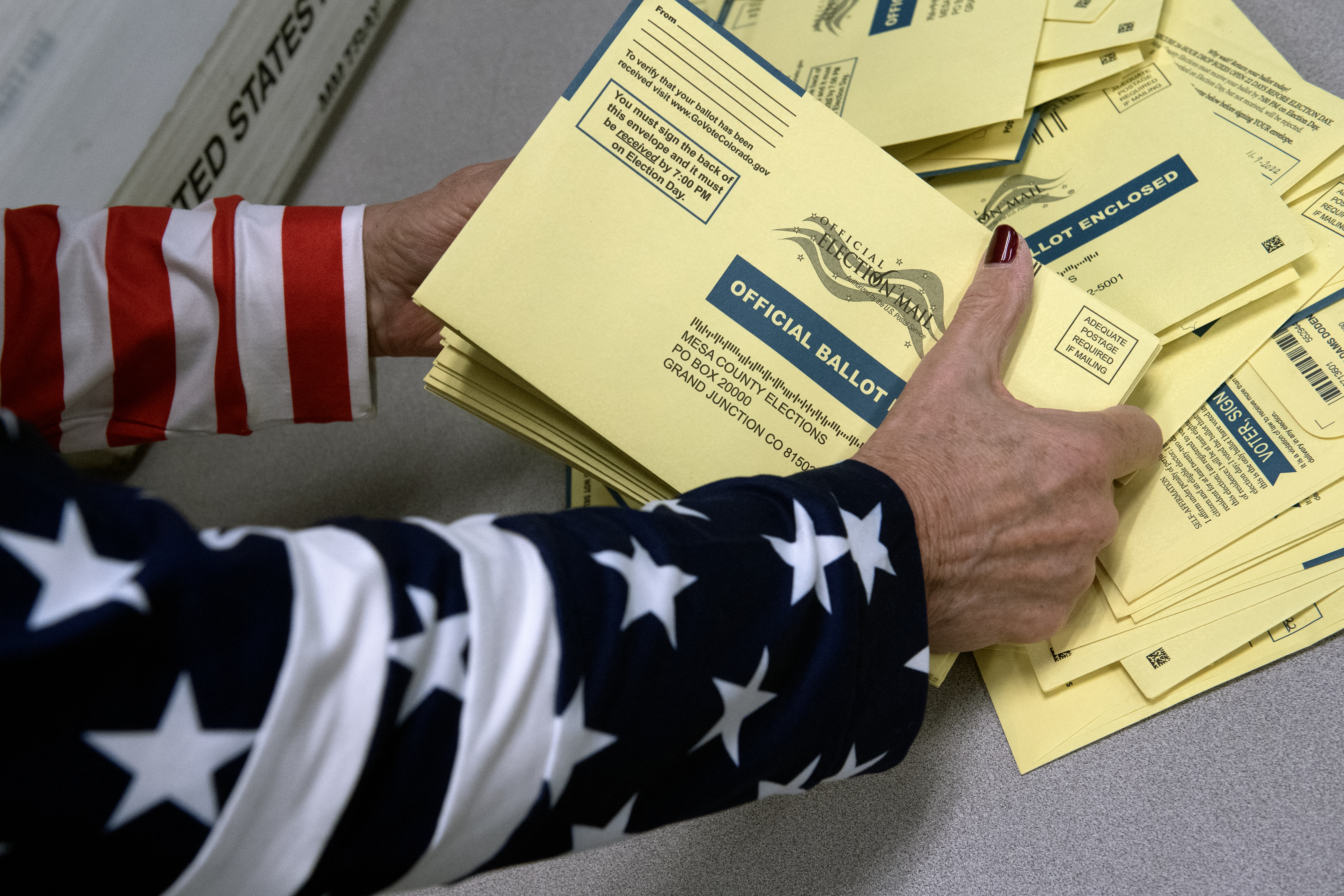 An election worker sorts ballots for the US midterm election, at Mesa County Central Services in Grand Junction.
