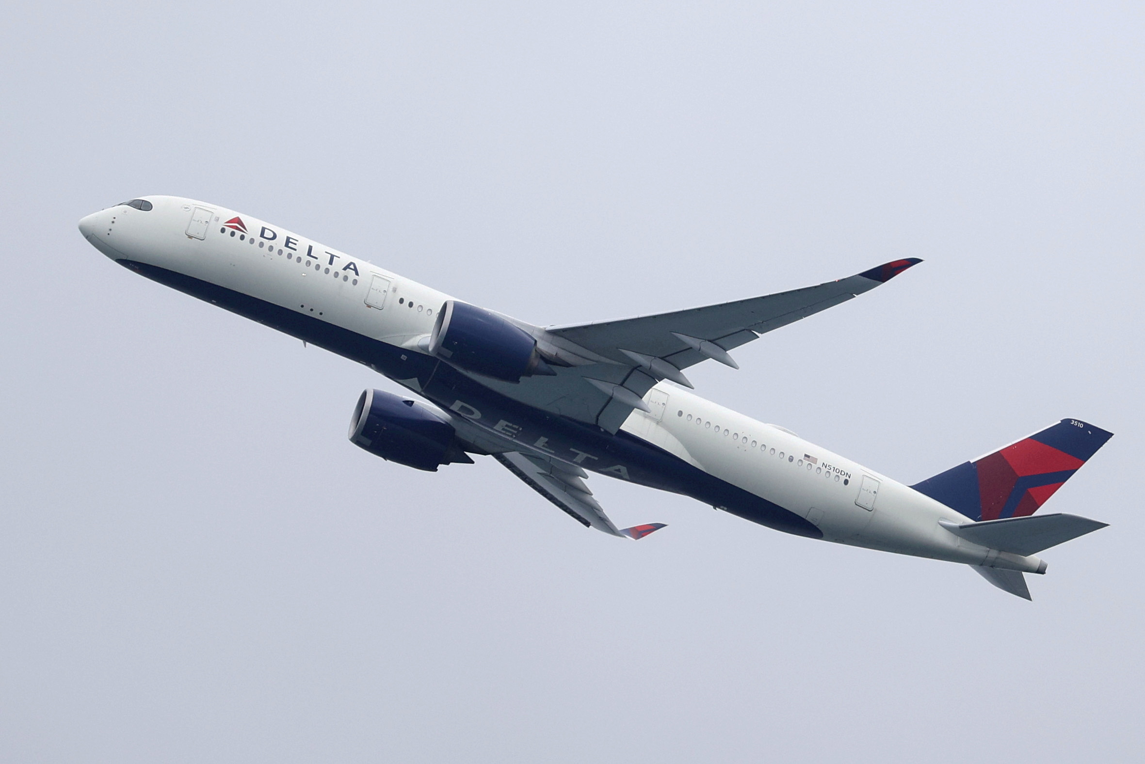 A Delta Air Lines Airbus A350-900 plane takes off from Sydney Airport in Sydney, Australia.