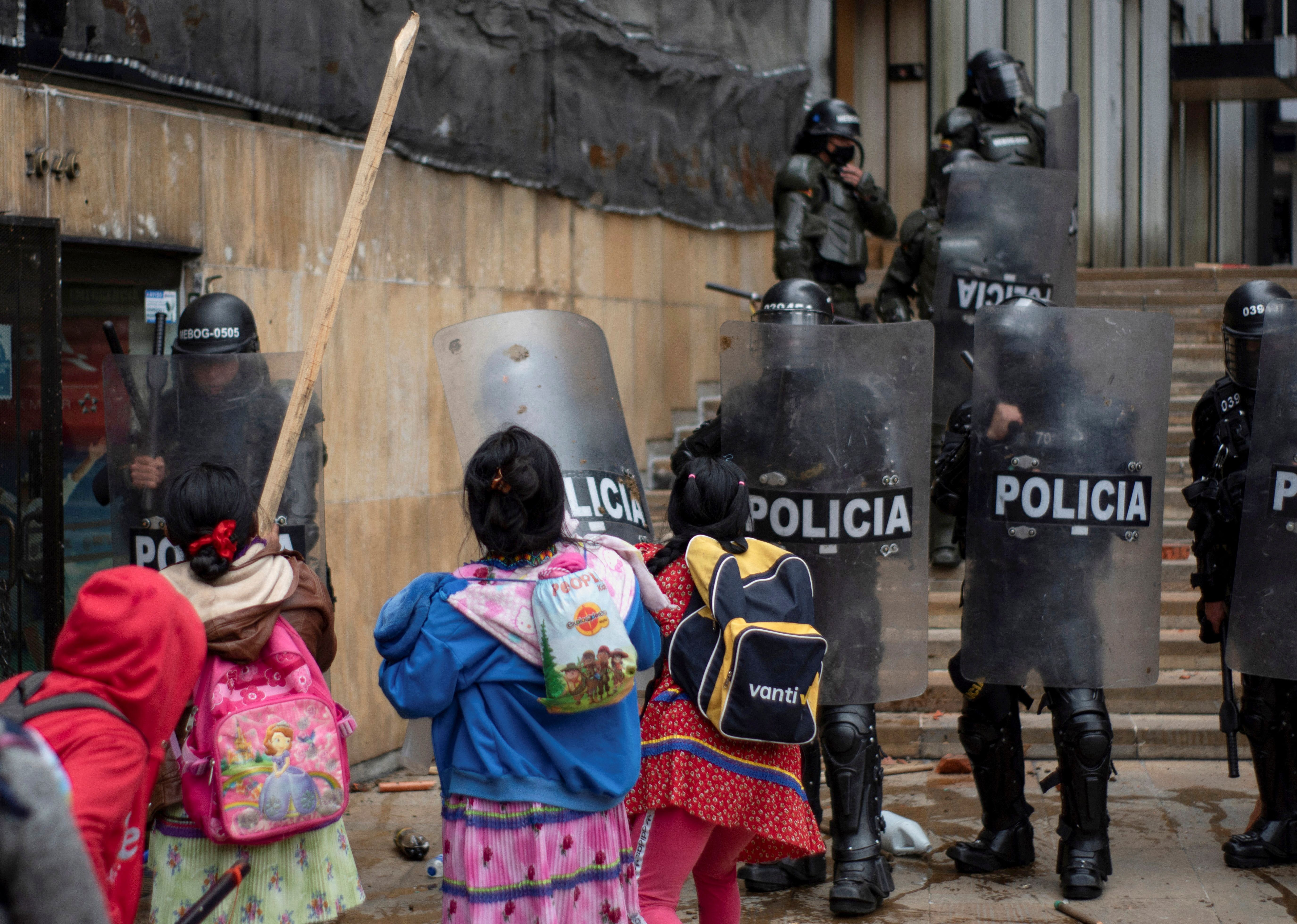 Embera Indigenous people clash with riot police.