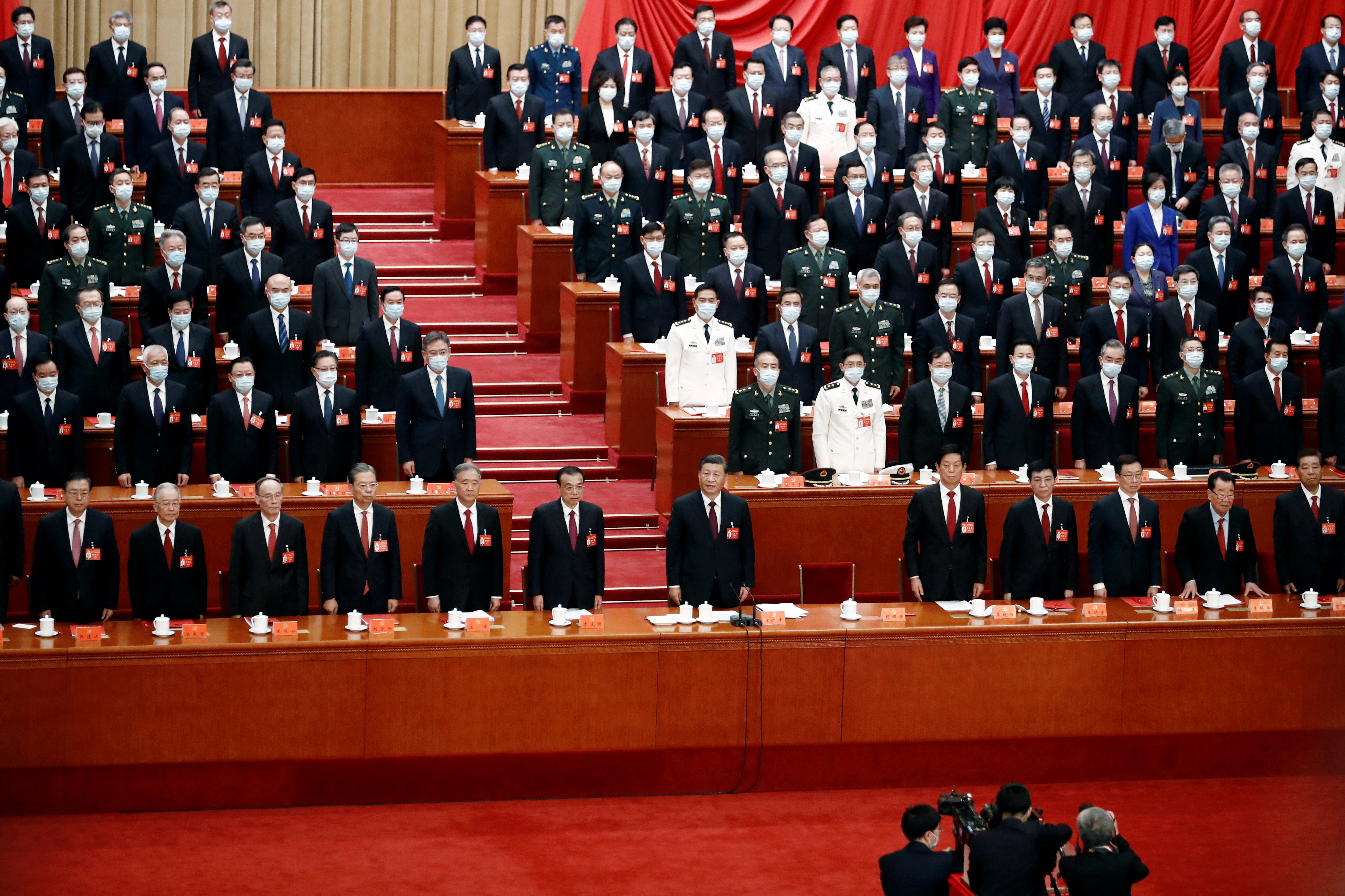 Chinese President Xi Jinping and other officials attend the closing ceremony of the 20th National Congress of the Communist Party of China, at the Great Hall of the People in Beijing, China October 22, 2022.