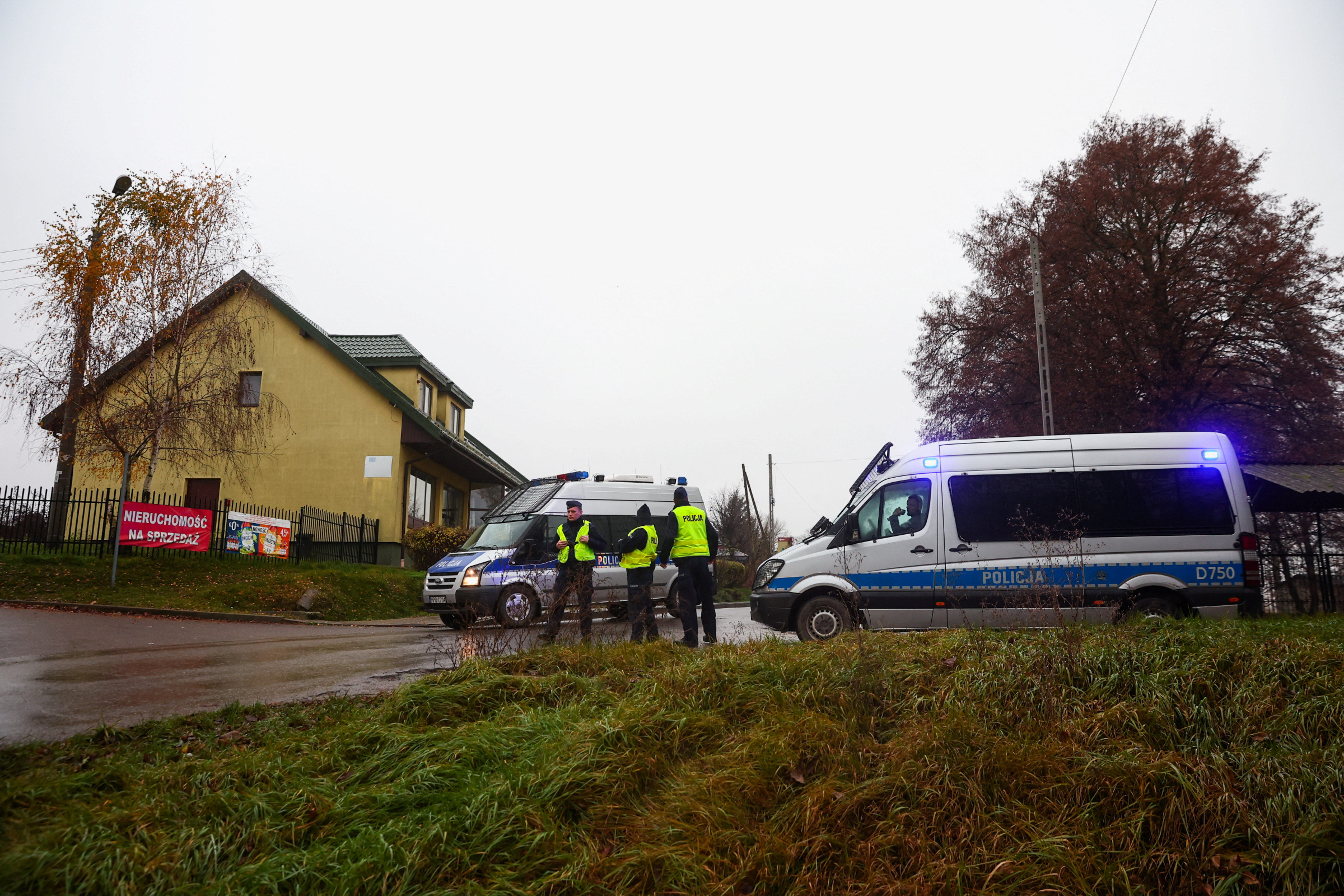 Police officers stand at a blockade after an explosion in Przewodow, a village in eastern Poland near the border with Ukraine
