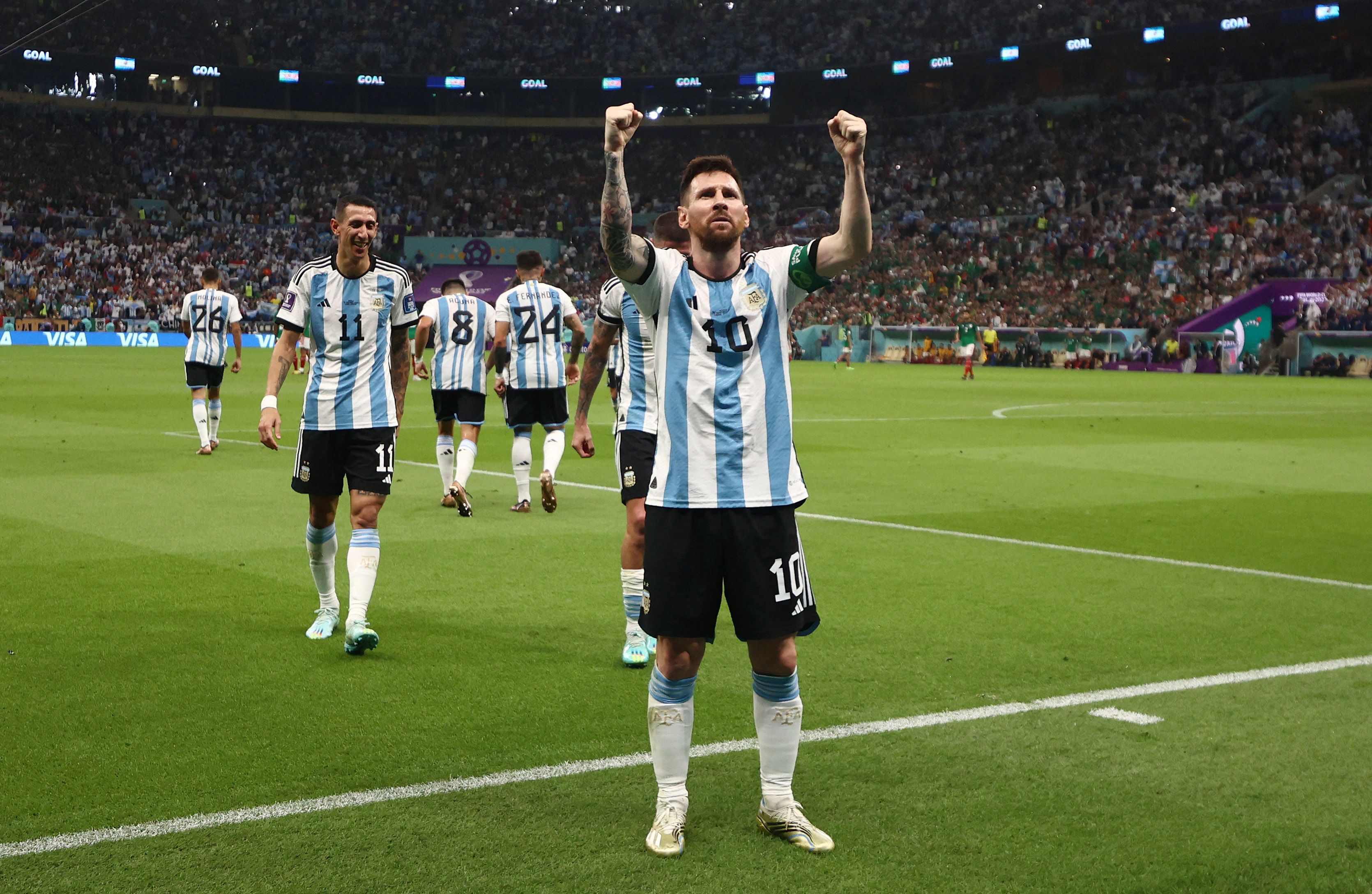 Argentina's Lionel Messi celebrates scoring their first goal. 