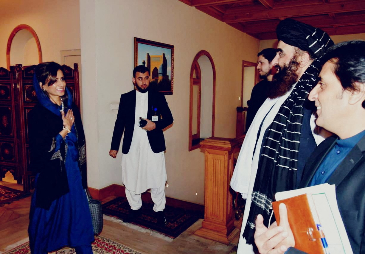 Pakistan's Minister of State Hina Rabbani Khar, welcomed by the acting Afghan foreign Minister Amir Khan Muttaqi.