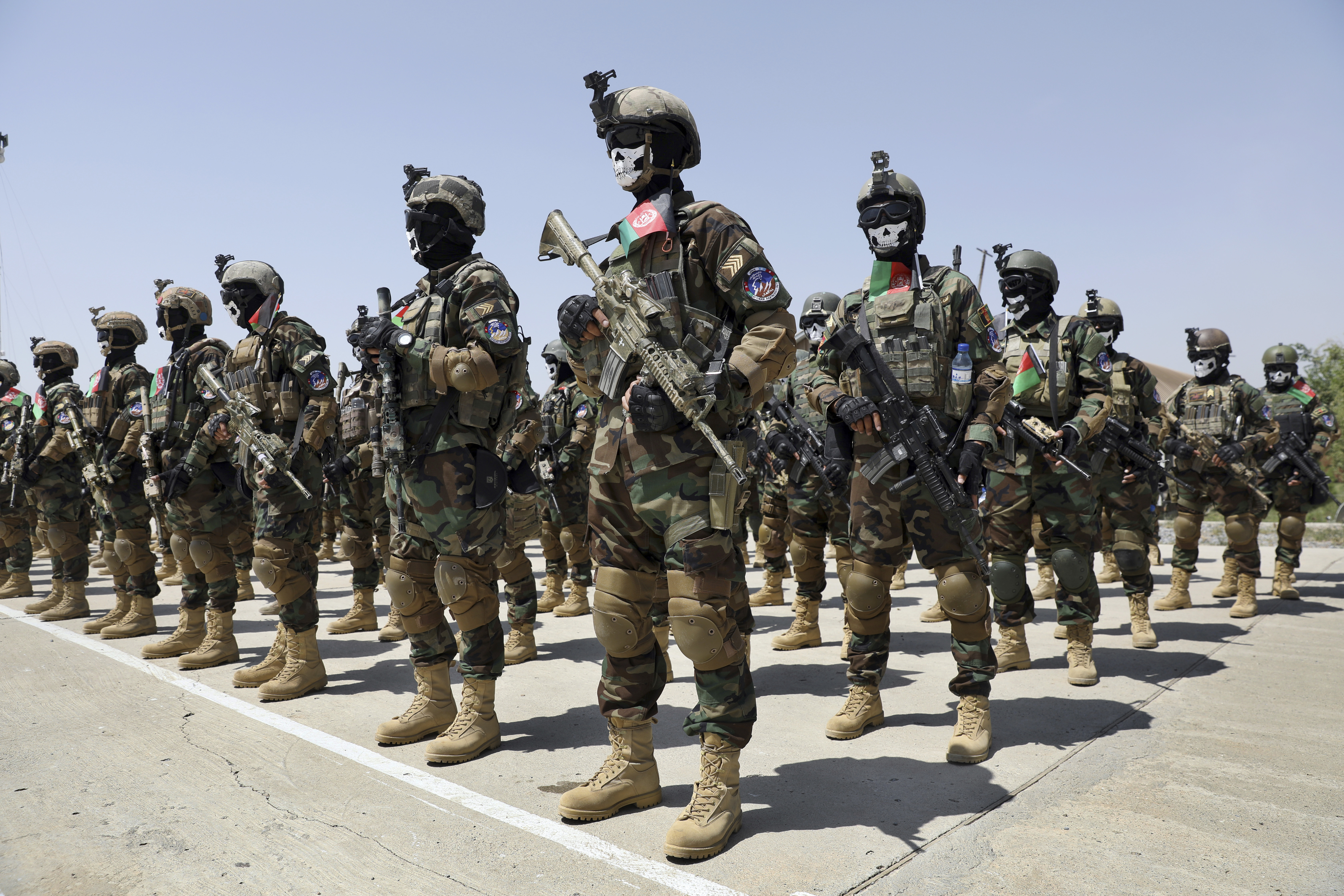 New Afghan Army special forces members, in formation, attend their graduation ceremony at the Kabul Military Training Center in Kabul, Afghanistan.