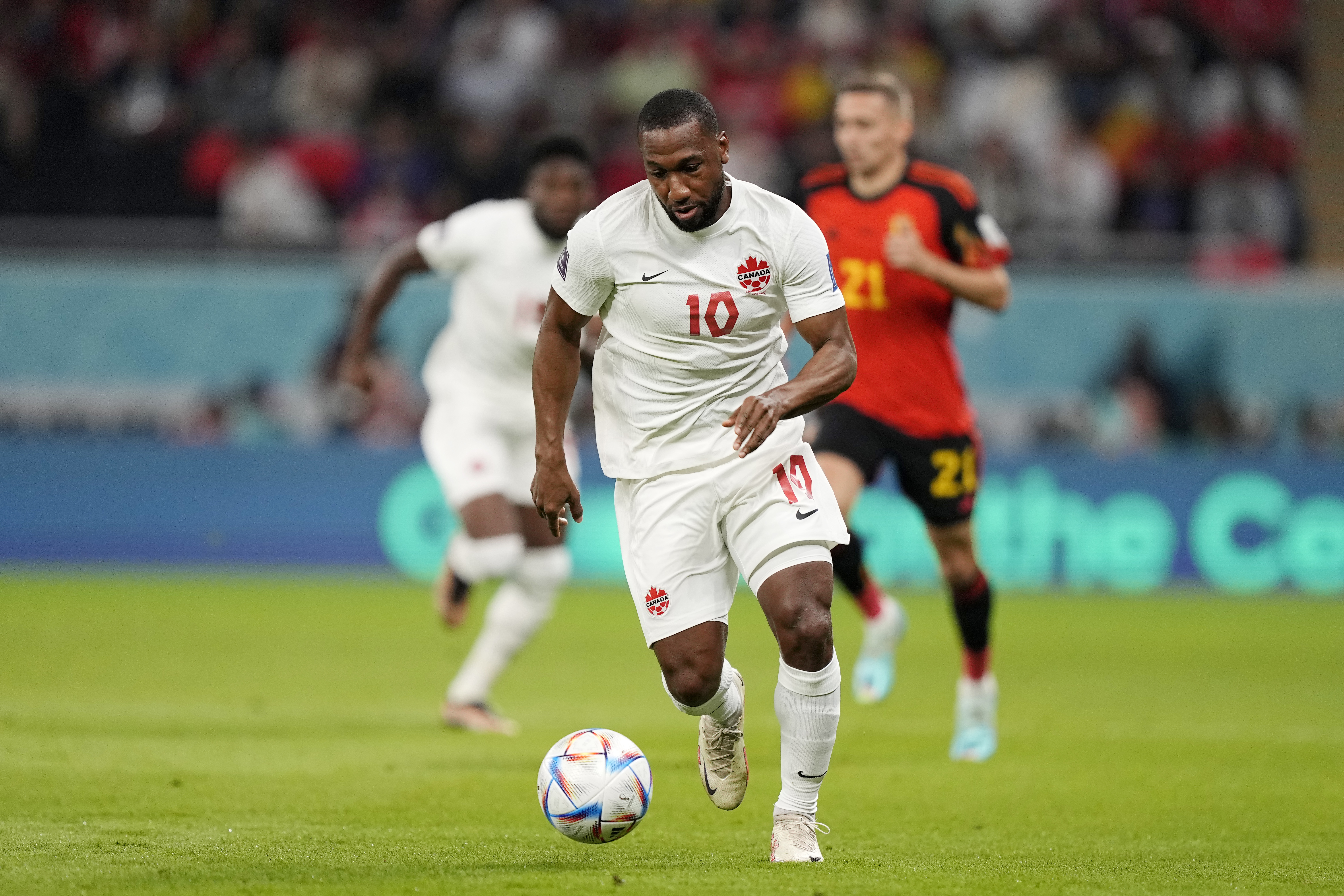Canada's Junior Hoilett controls the ball during the World Cup group F soccer match between Belgium and Canada, at the Ahmad Bin Ali Stadium in Doha, Qatar, Wednesday, Nov. 23, 2022. (AP Photo/Martin Meissner)