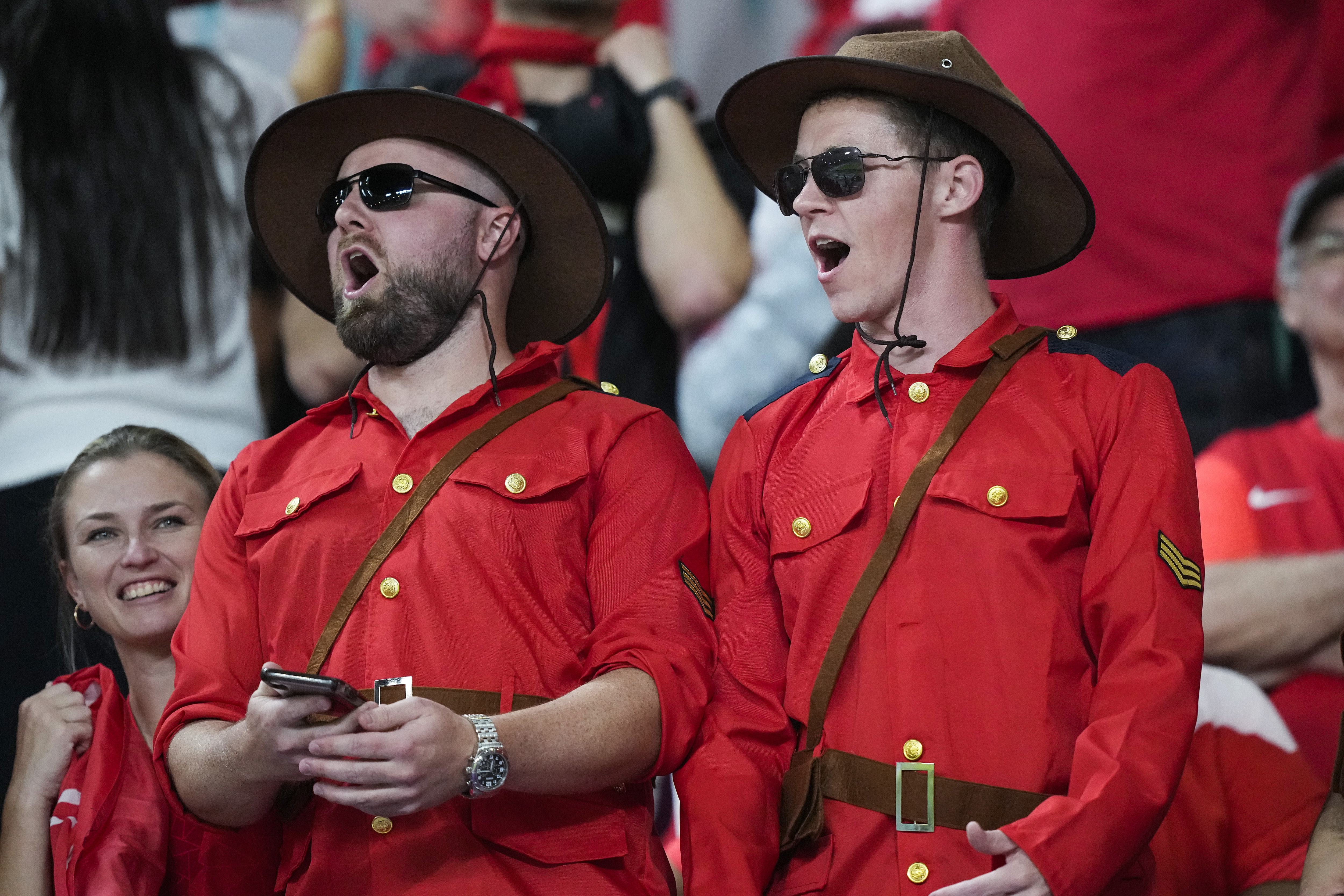 Canadian fans cheer at the stand prior the World Cup group F soccer match