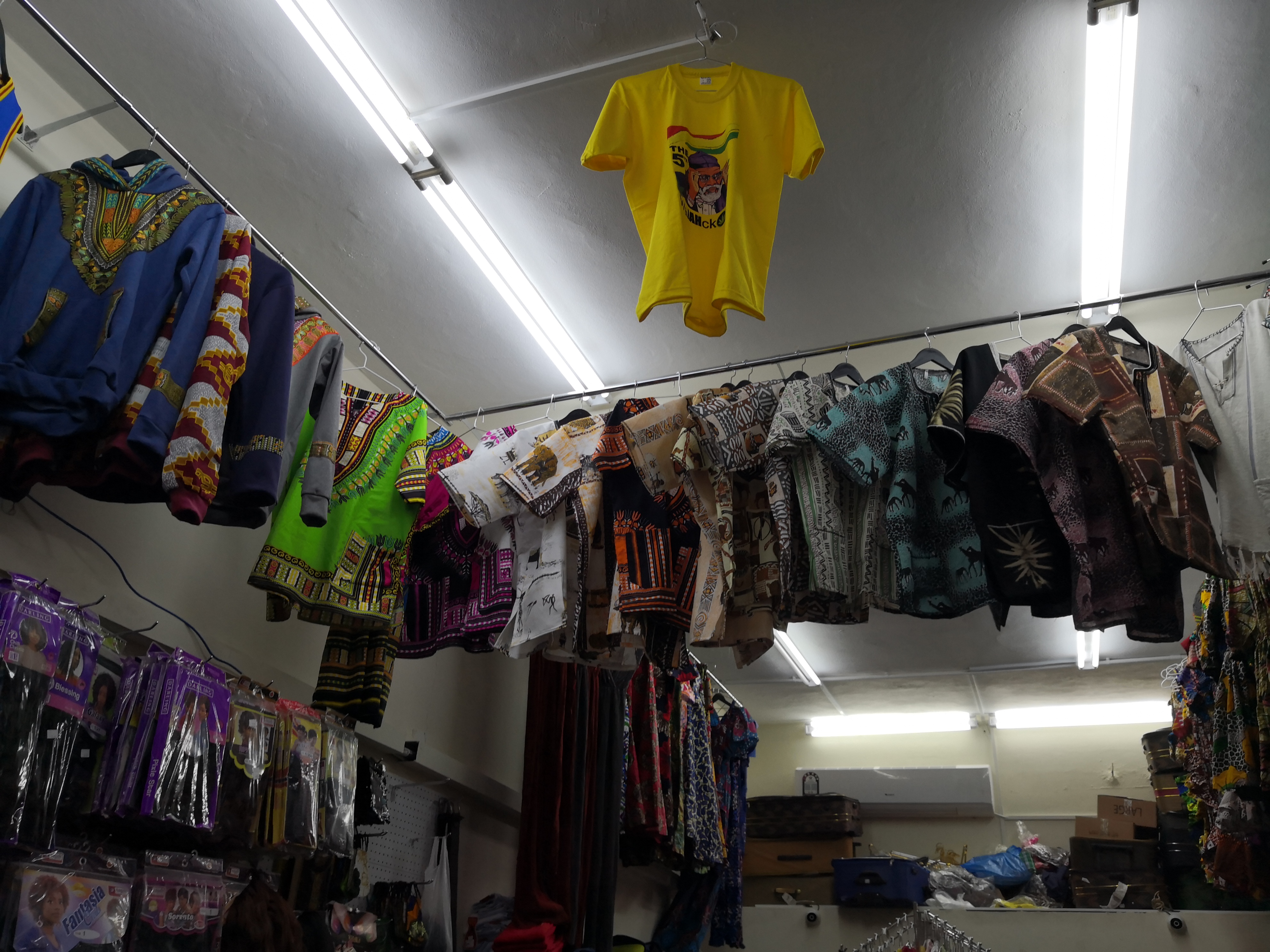 A photo of shirts being sold.