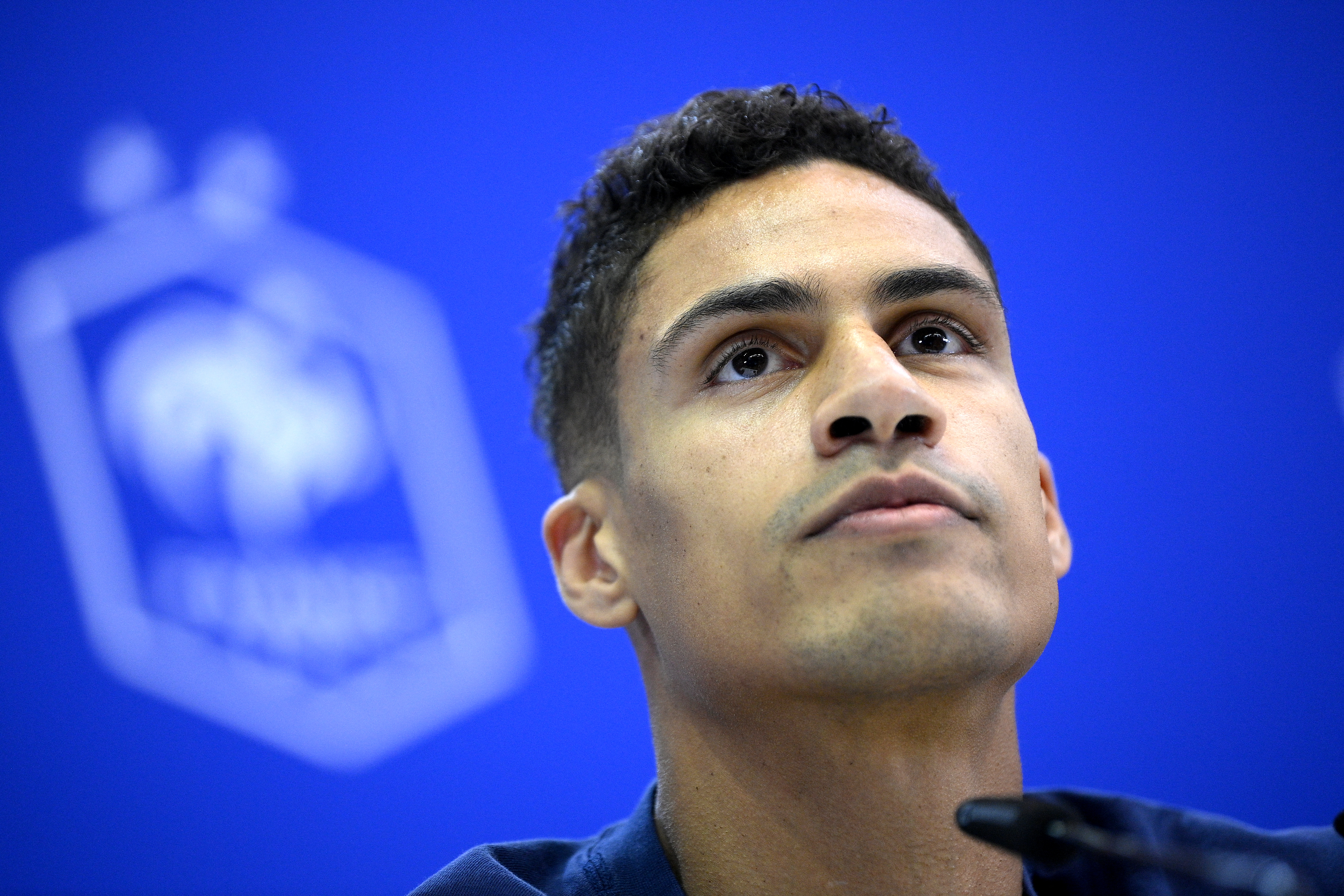 France's defender Raphael Varane gives a press conference.