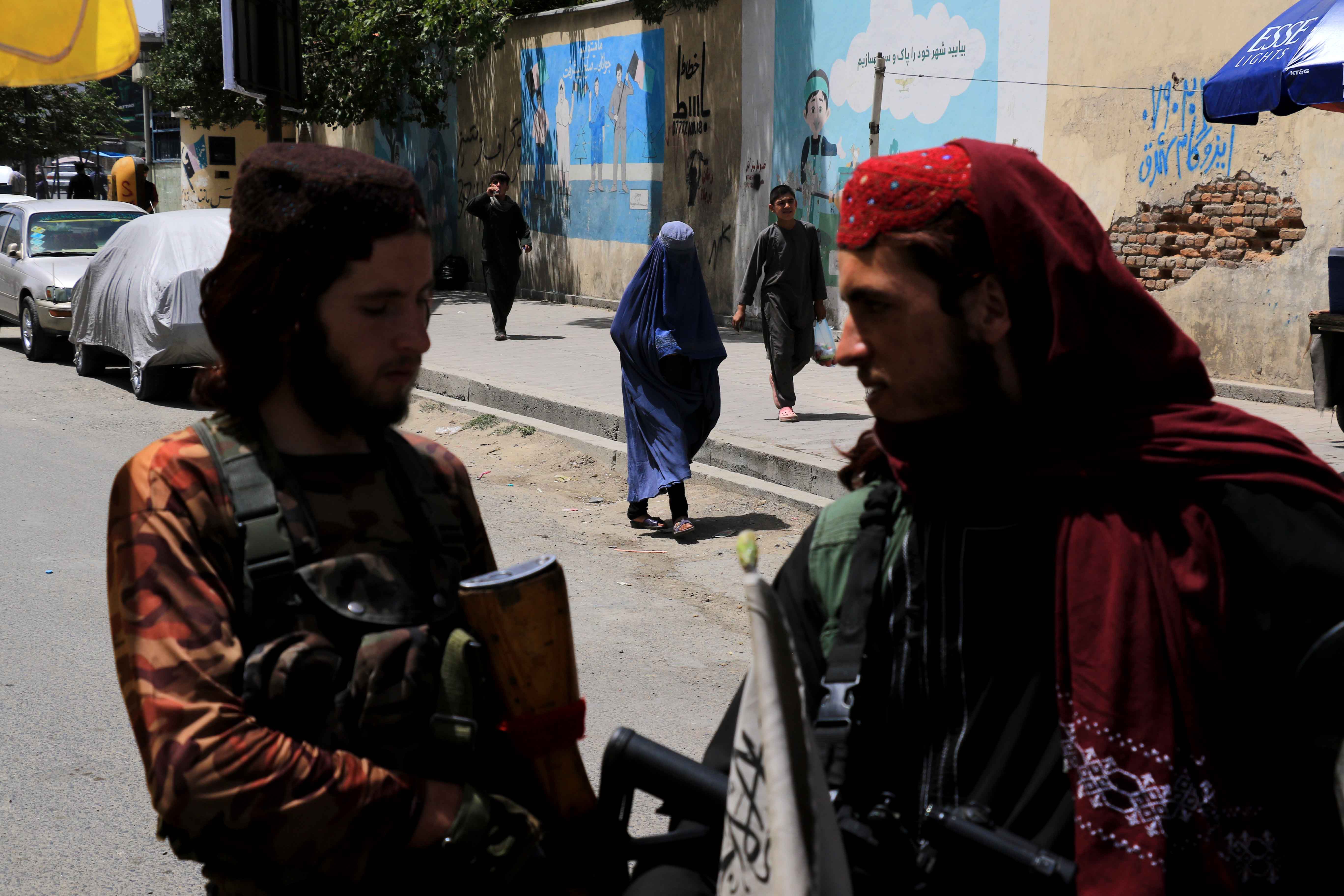 Taliban stand guard outside Kabul University