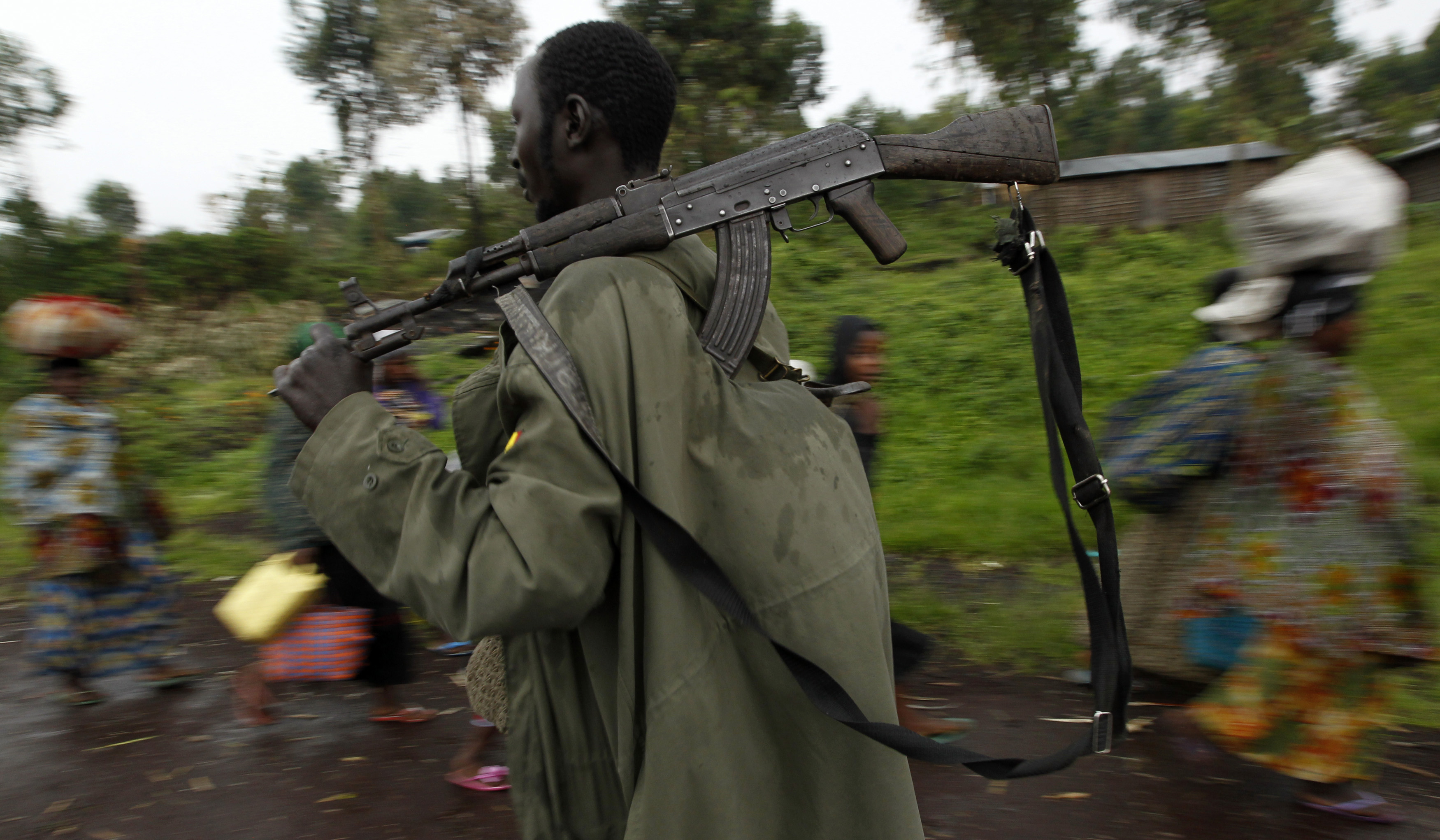 A Congolese rebel fighter with a gun