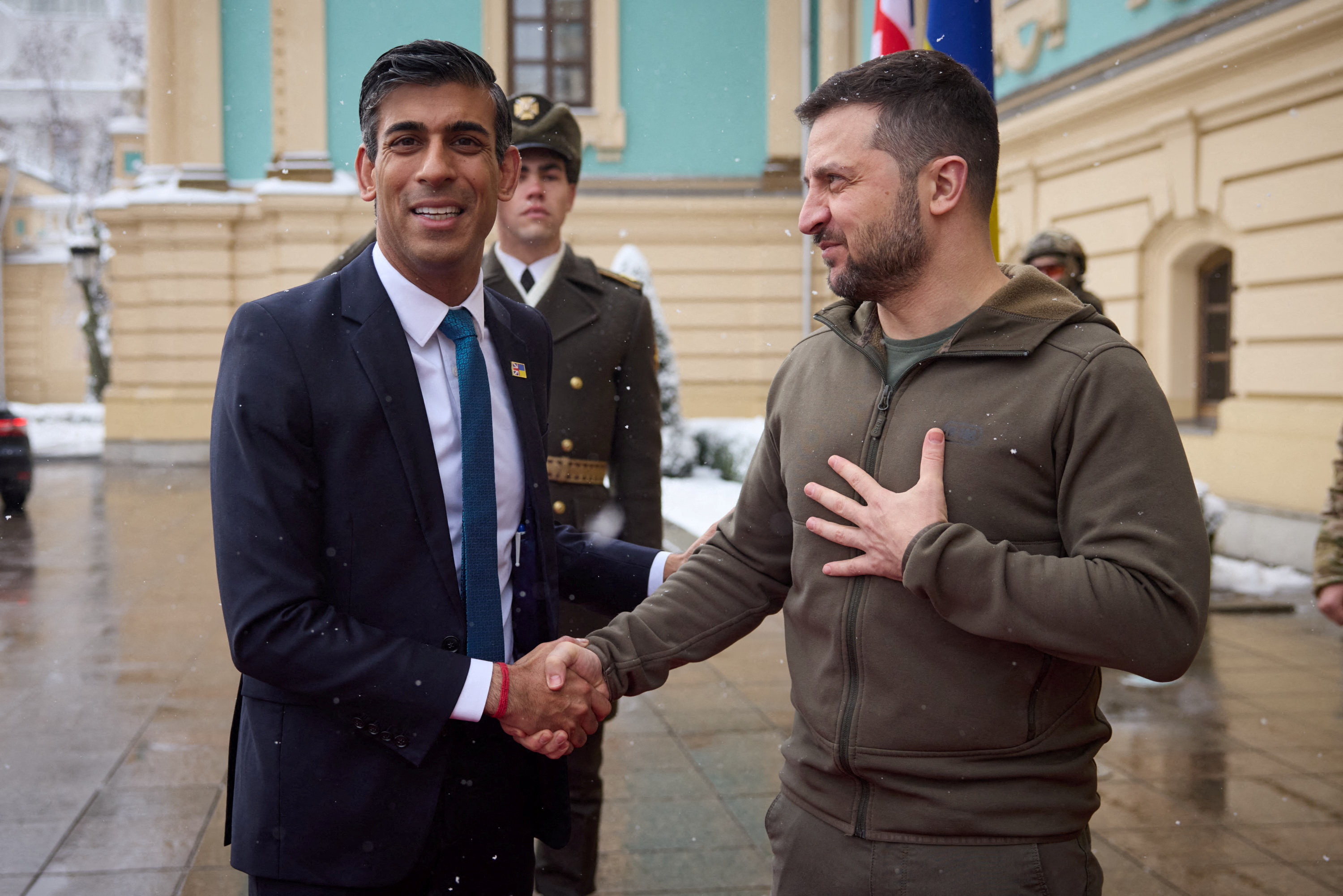 Ukraine's President Volodymyr Zelenskiy shakes hands with British Prime Minister Rishi Sunak during a meeting in Kyiv, Ukraine.