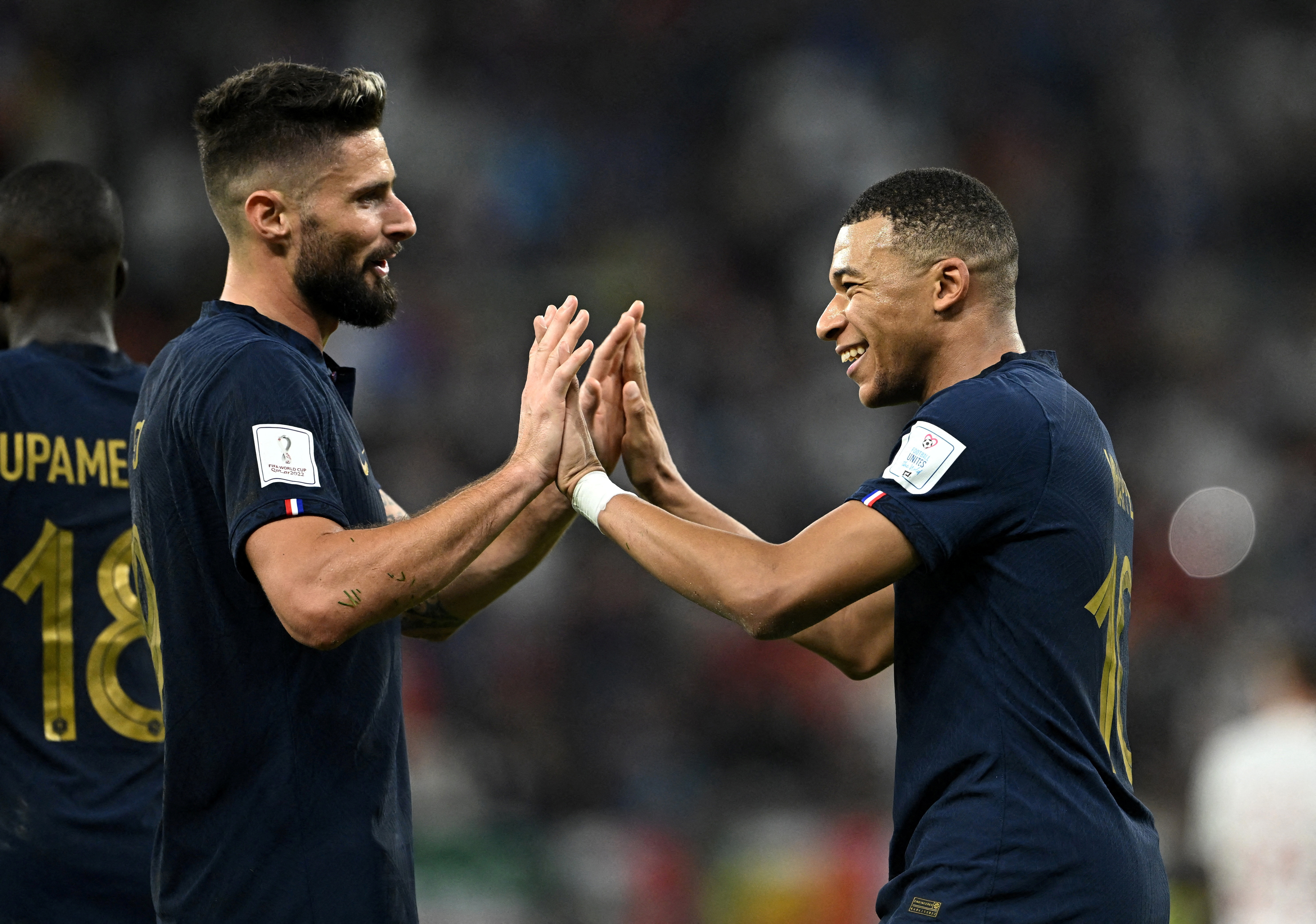 France's Kylian Mbappe celebrates scoring their second goal with Olivier Giroud.