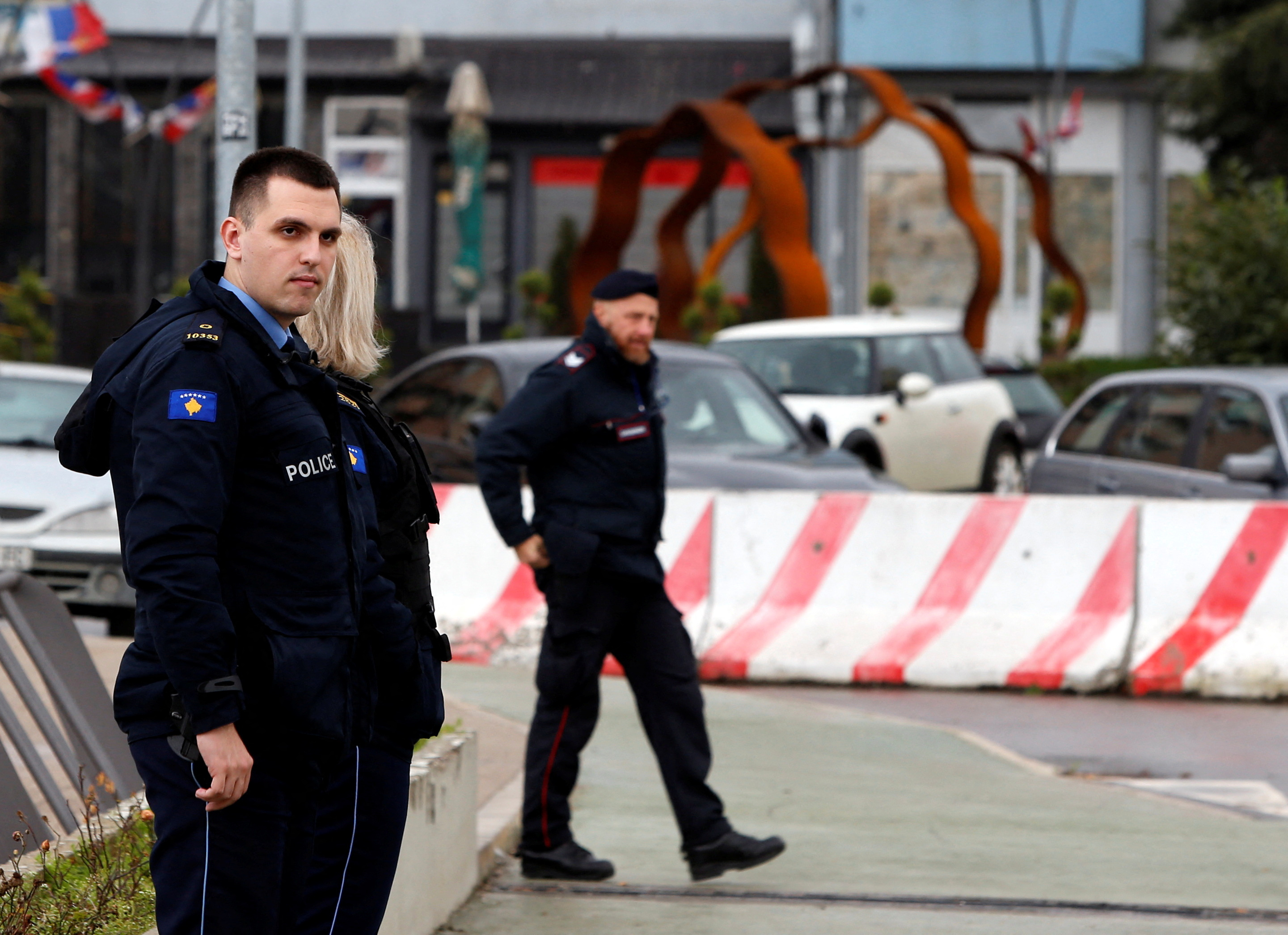 Italian carabinieri and Kosovo police officers patrol the bridge which connects south and north Mitrovica in North Mitrovica