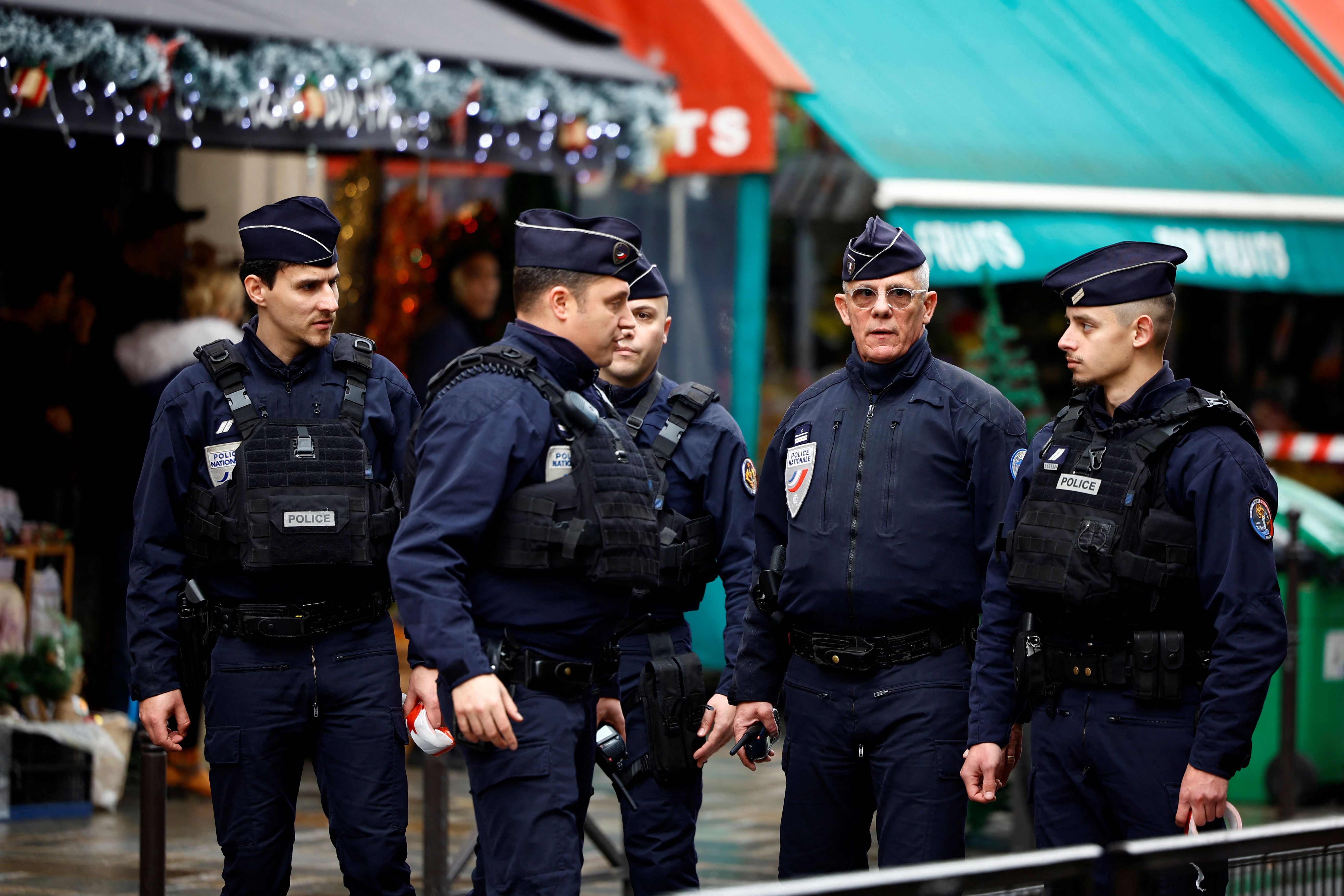 French police secure a street after gunshots were fired killing two people and injuring several in a central district of Paris, France, December 23, 2022. REUTERS/Sarah Meyssonnier