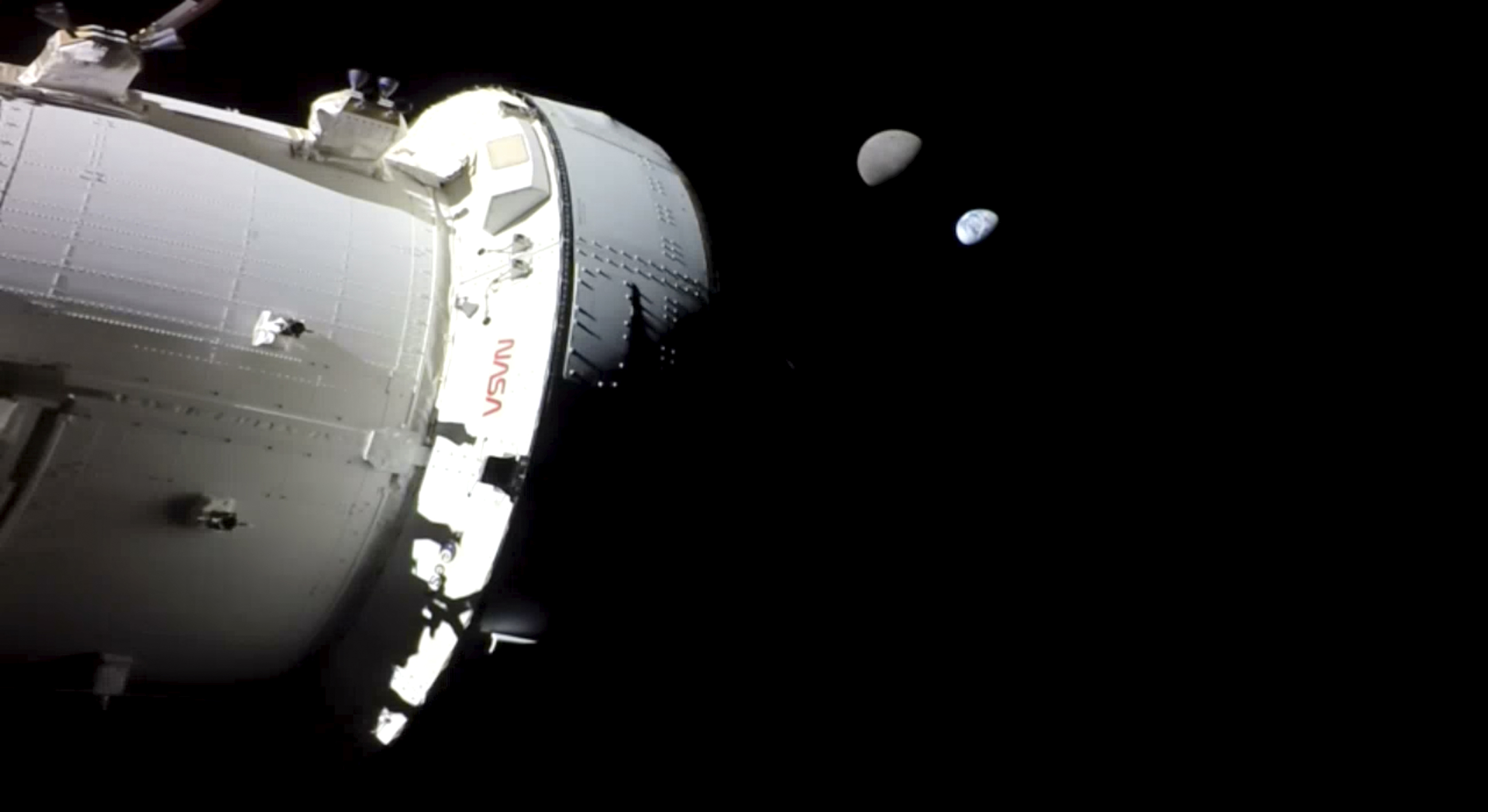 Earth and its moon are seen from NASA's Orion