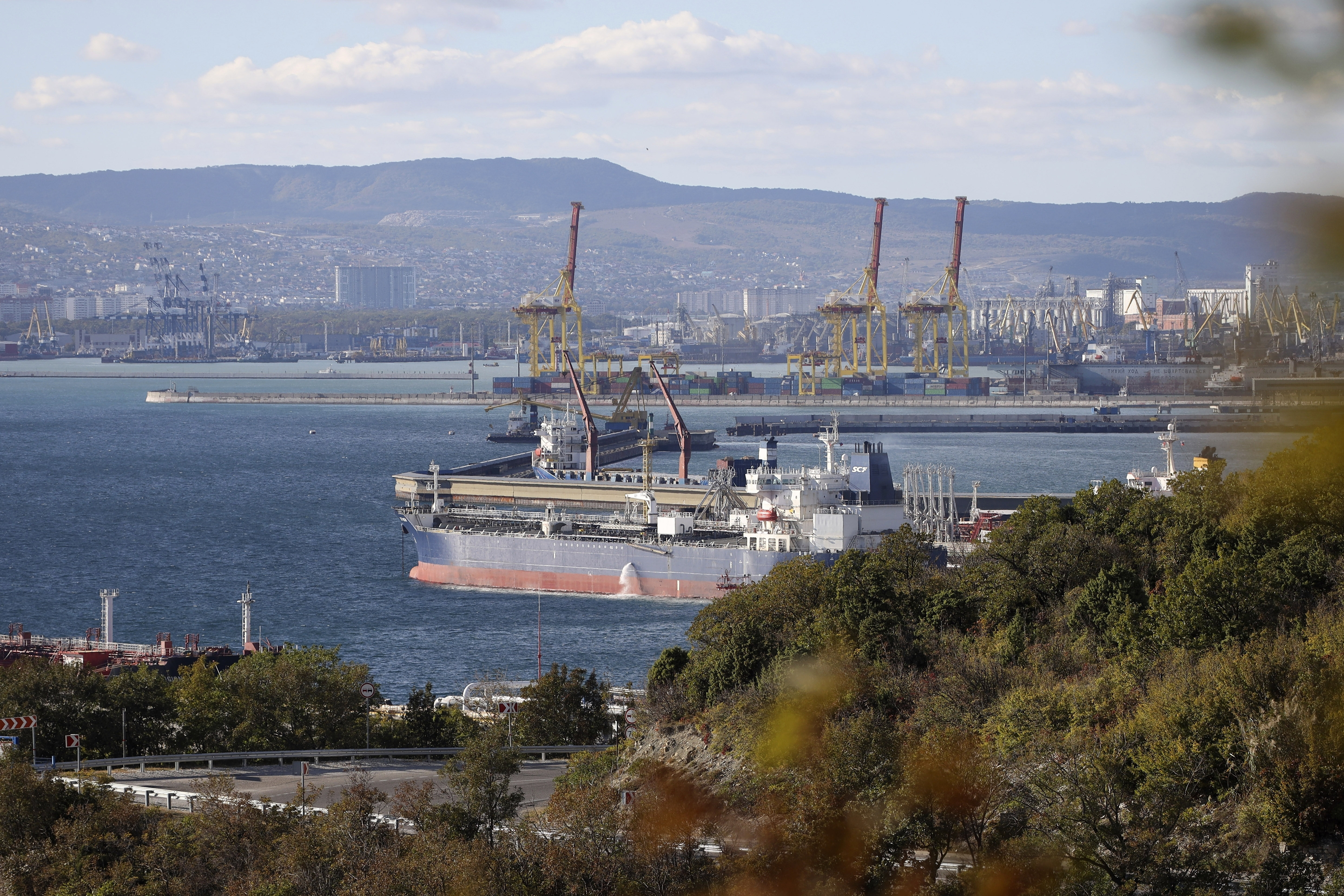 FILE An oil tanker is moored at the Sheskharis complex, part of Chernomortransneft JSC, a subsidiary of Transneft PJSC, in Novorossiysk, Russia, Tuesday, Oct. 11, 2022, one of the largest facilities for oil and petroleum products in southern Russia. The European Union reached a deal Friday for a $60-per-barrel price cap on Russian oil, a key step as Western sanctions aim to reorder the global oil market to prevent price spikes and starve President Vladimir Putin of funding for his war in Ukraine. (AP Photo, File)