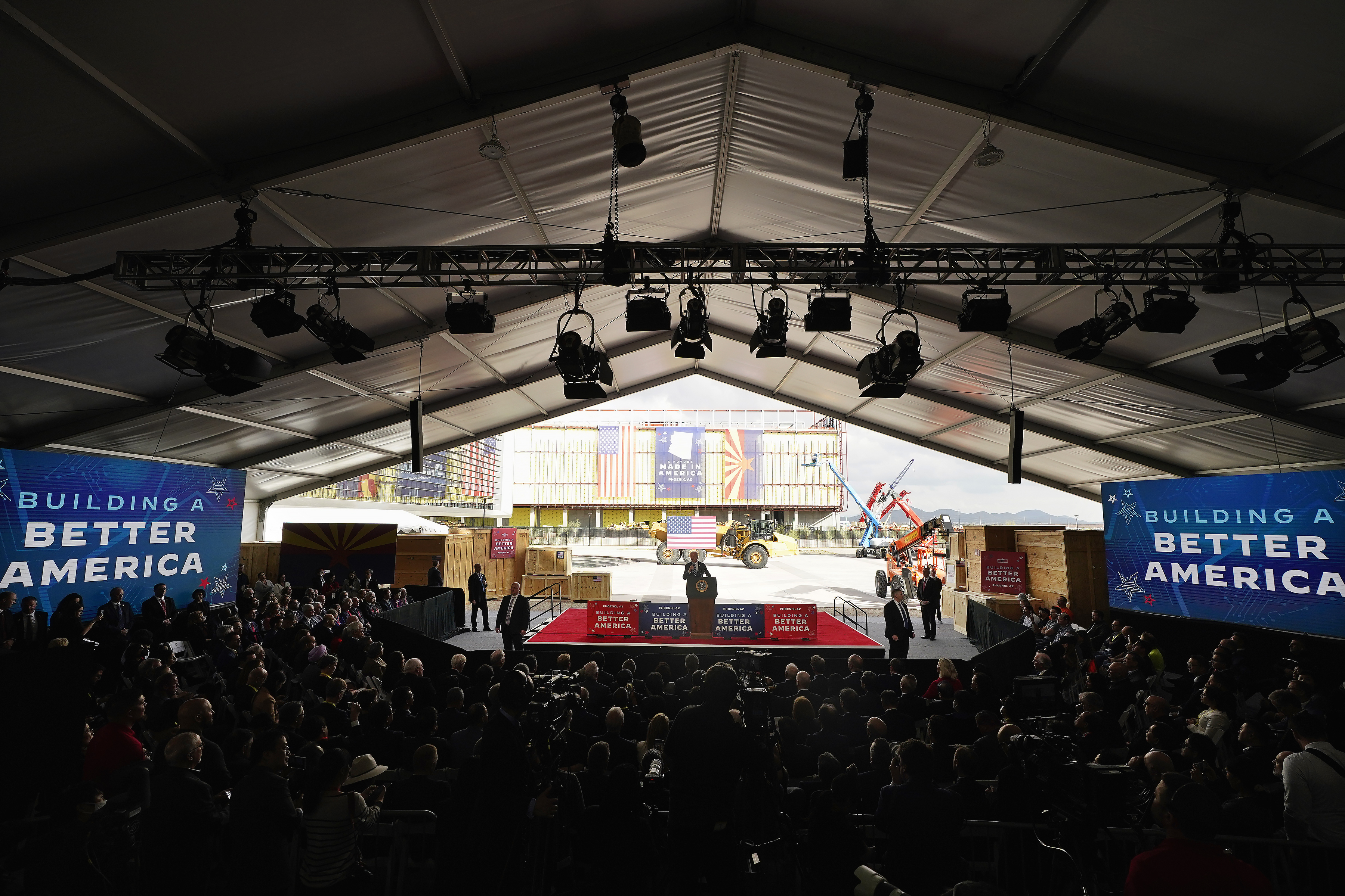 President Joe Biden speaks after touring the Taiwan Semiconductor Manufacturing Company facility in Phoenix, US