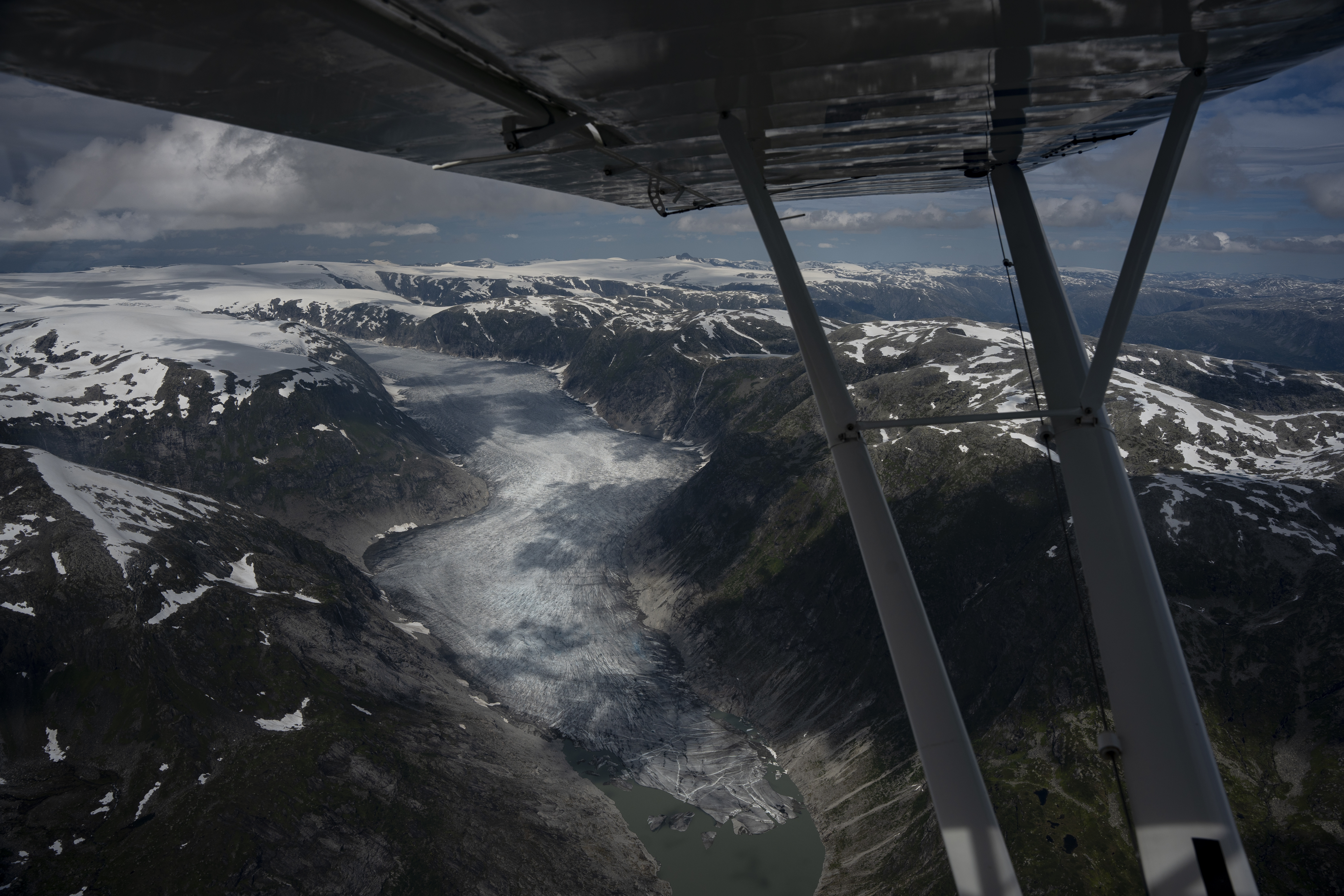 A glacier is seen from Garrett Fisher's plane