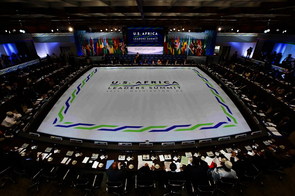 A meeting of leaders from Africa around a large conference area