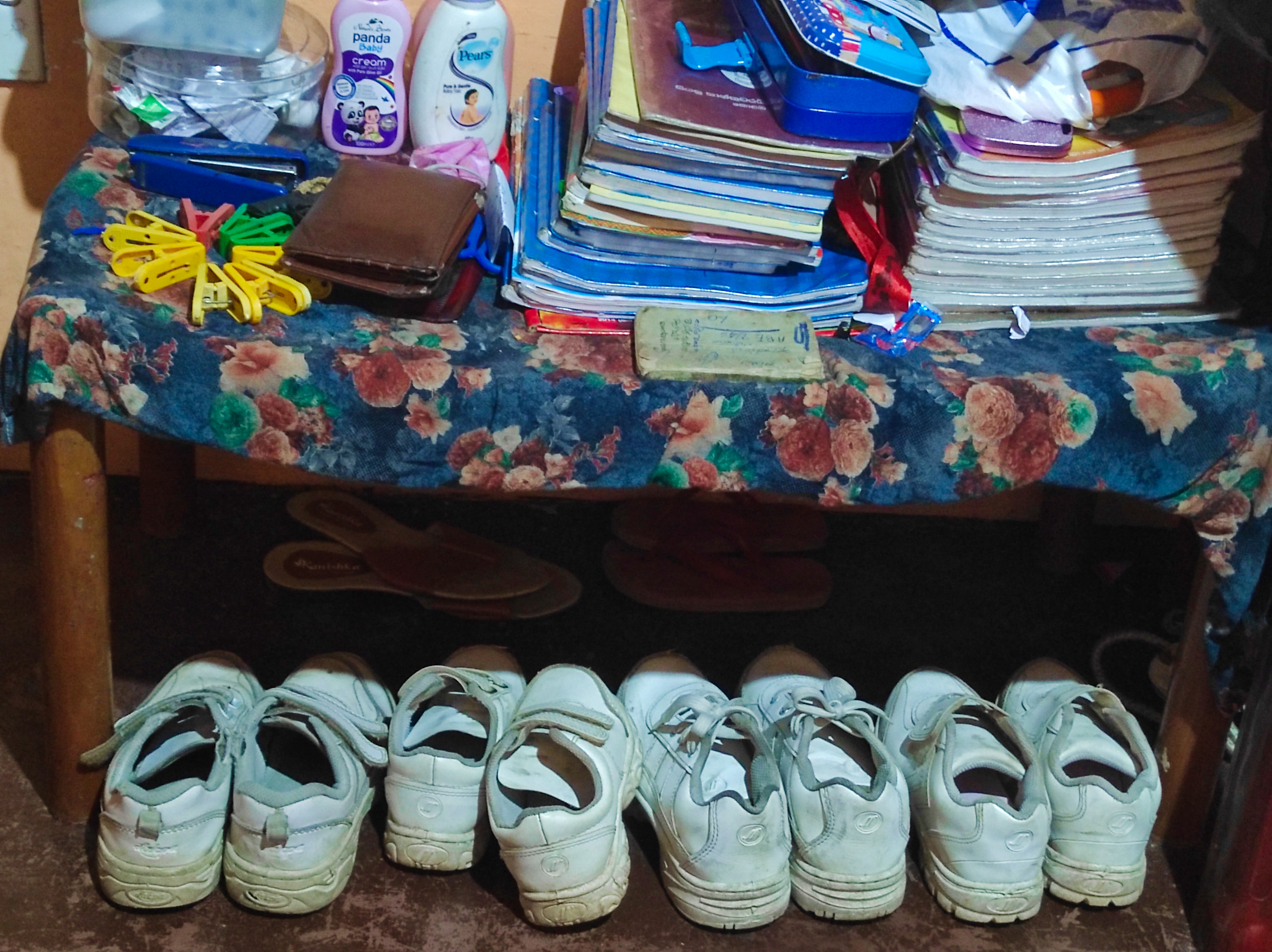 Children's shoes and school books